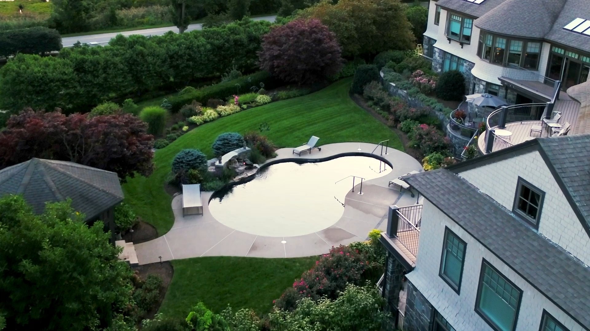 pool and landscaped yard