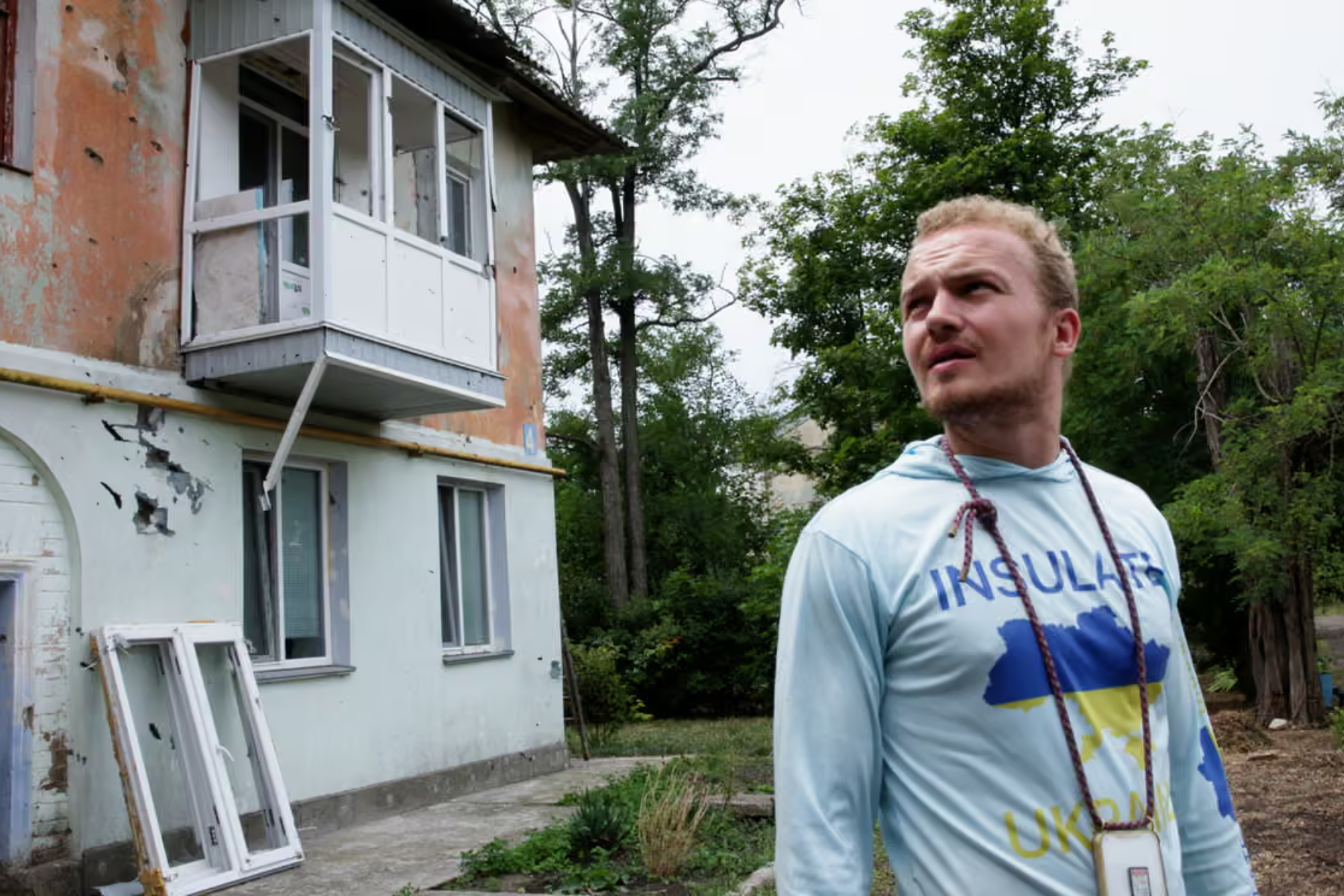 A damaged building with broken windows in Ukraine