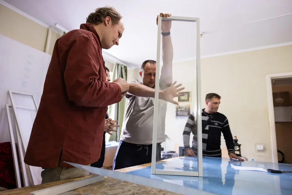 Insulate Ukraine WindowKit being assembled during trials in Nikopol