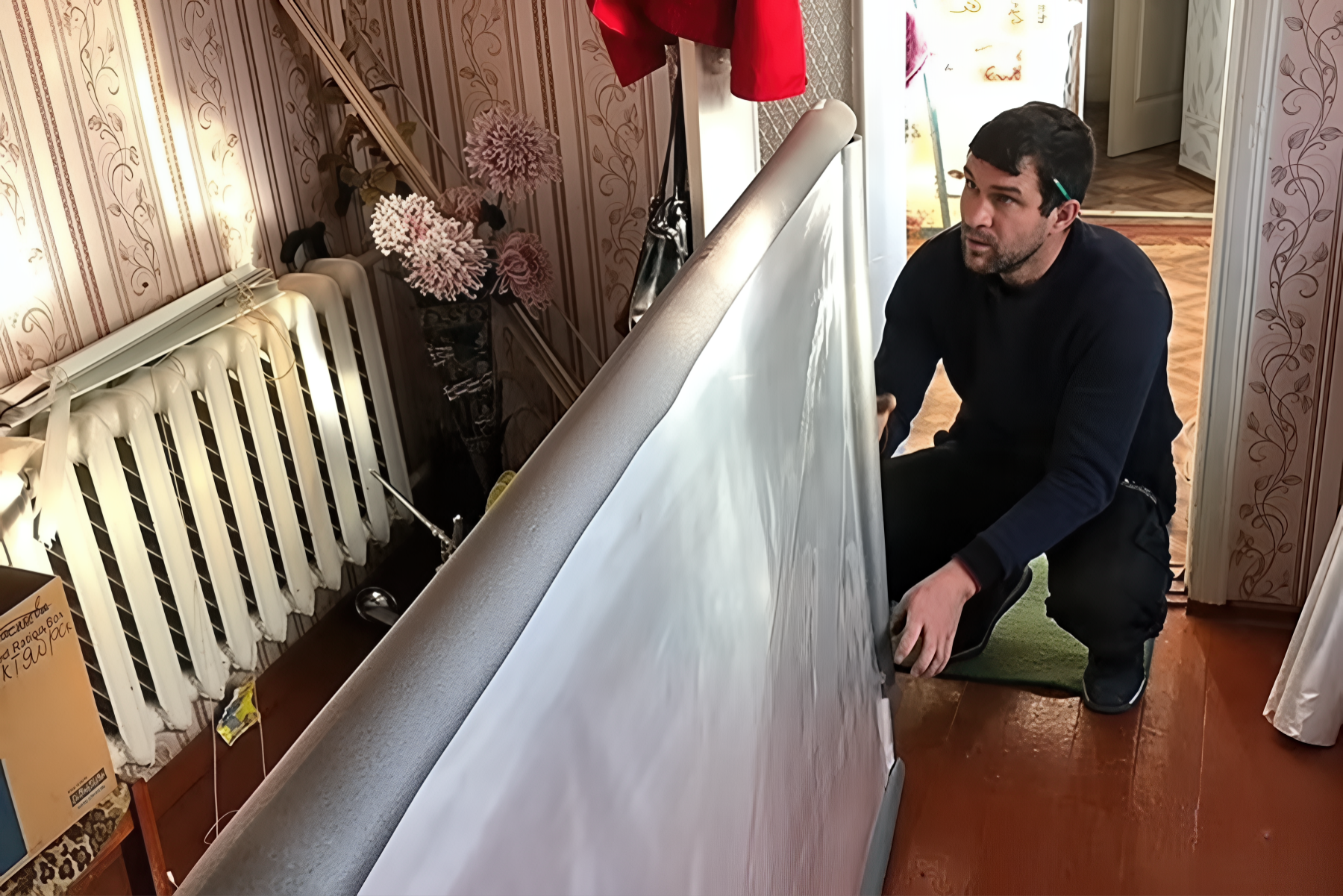 An Insulate Ukraine window installed in a damaged home