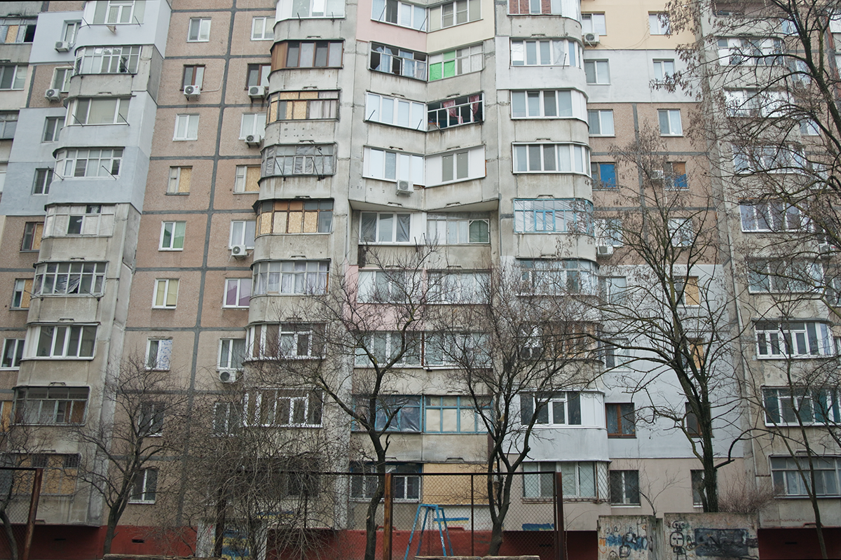 An Insulate Ukraine window installed in a damaged home