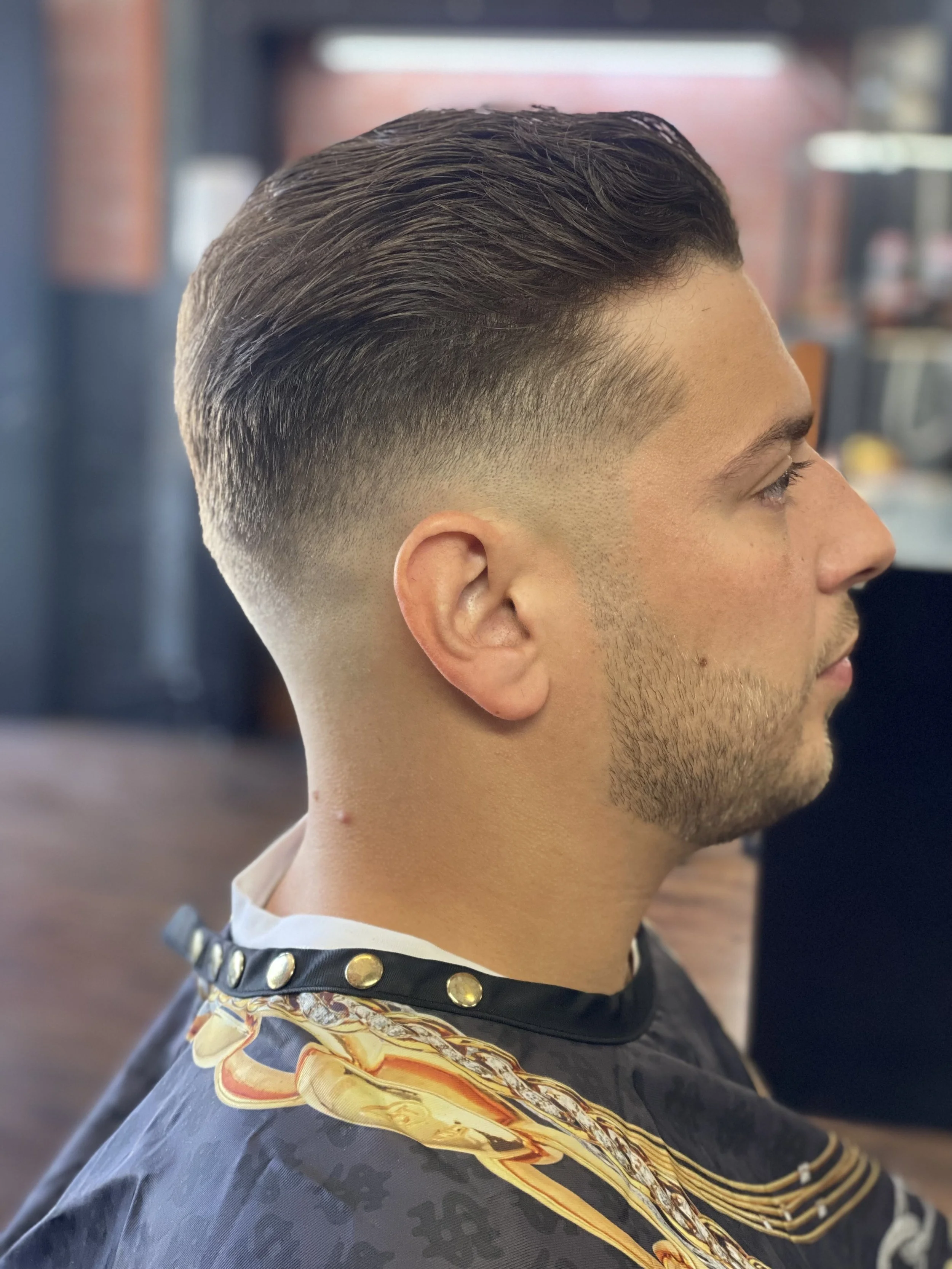 Gents Barbershop Interior with Customers
