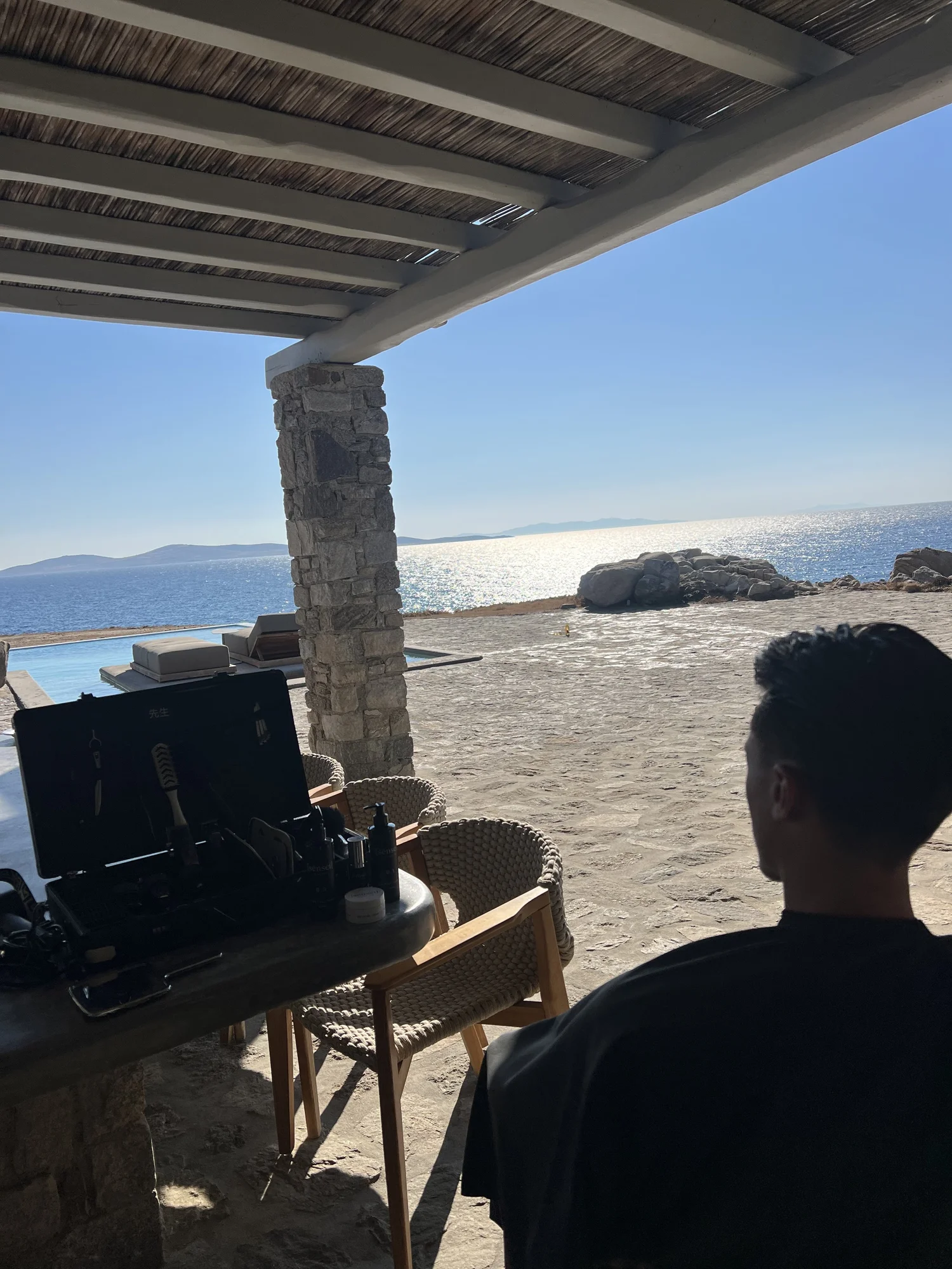 A [sēnsei] campaign shot on a villa terrace
