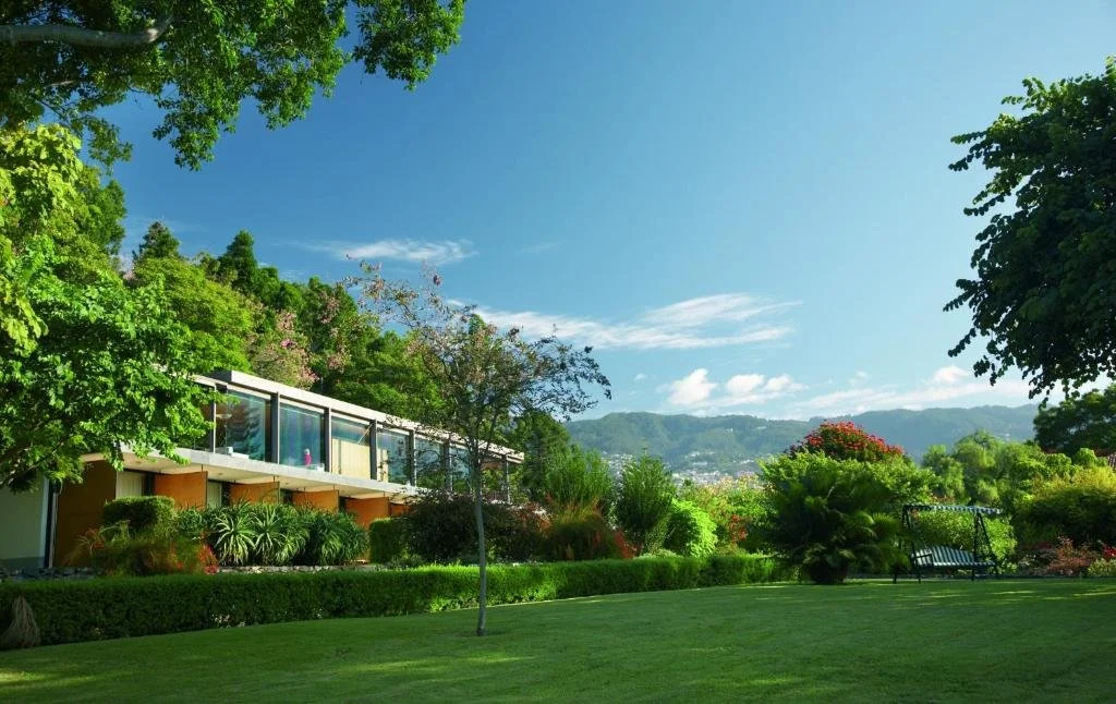 Quinta da Casa Branca Funchal modern garden pavilion set among tropical botanical gardens with mountain backdrop
