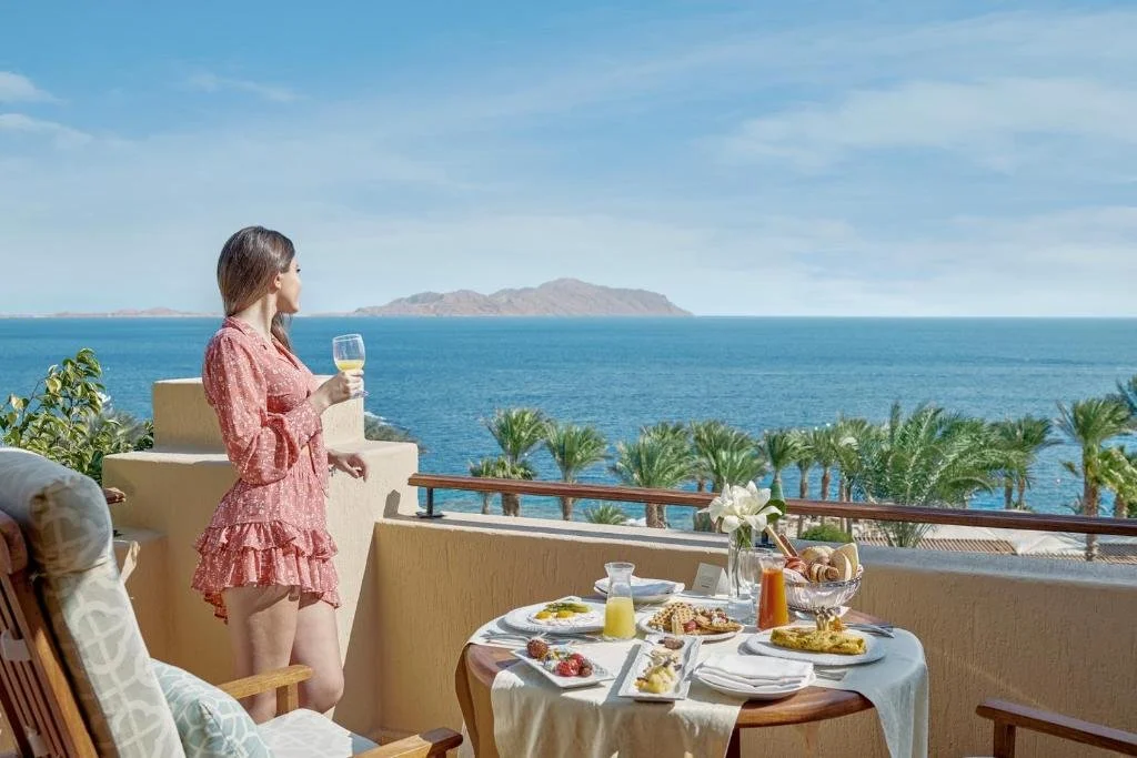 Four Seasons Resort Sharm El Sheikh private balcony breakfast table overlooking the Red Sea with Tiran Island in the distance