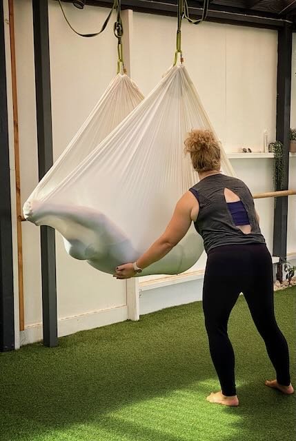 AHPRA-registered physiotherapist and ESSA exercise physiologist supervising a guest at Little Farm of Calm burnout retreat