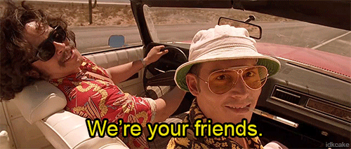 Animated GIF of a scene from Fear And Loathing that shows Hunter S Thompson and his friend in a car saying "We're your friends"