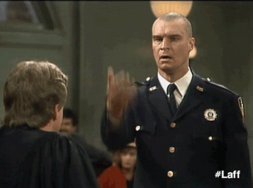 image of Bull from Night Court slamming the palm of his hand onto his forhead