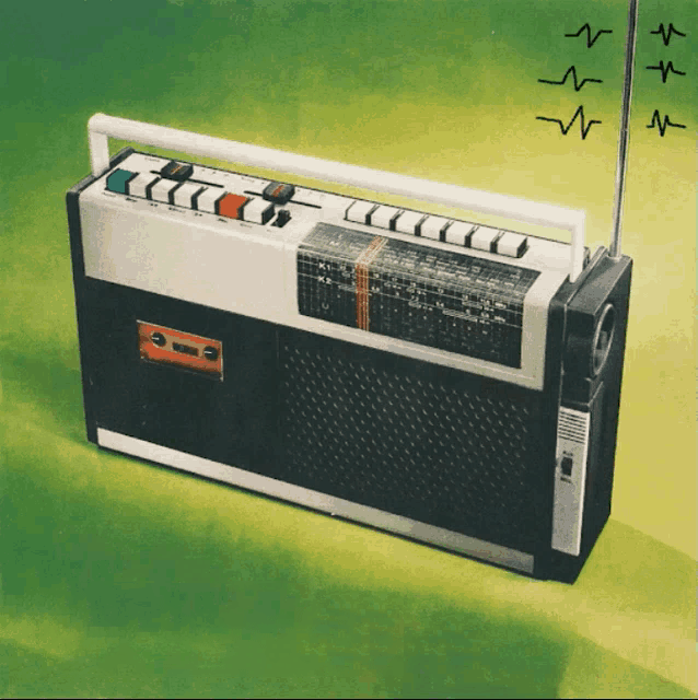 GIF of an old-style transistor radio on a green background. The only thing that's moving are a few hand-drawn little squiggles around the antennae, as if it's transmitting. The dial is also moving a tiny bit back and forth. 