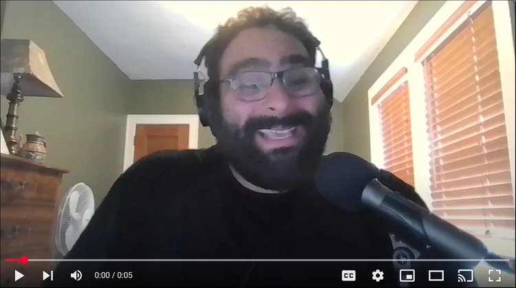 Still image of Jon on YouTube. Click to view or listen to his 5-second clue. 
