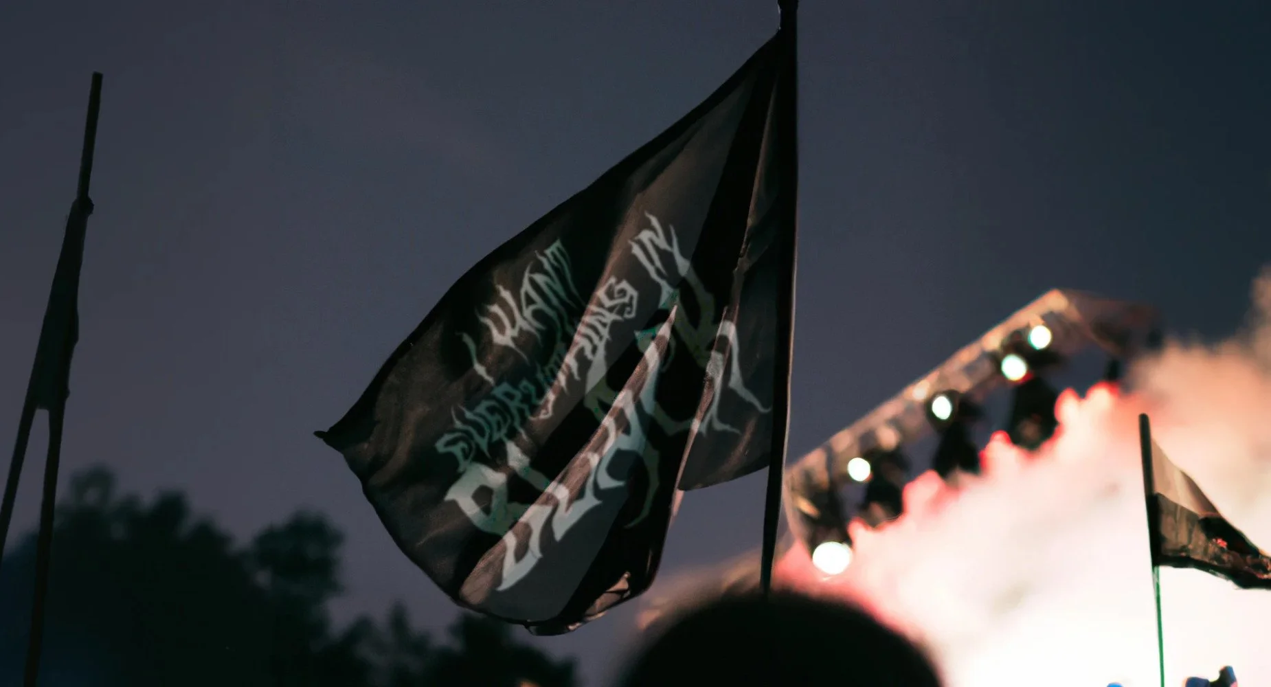 I Want Everything In Black flag at a live event