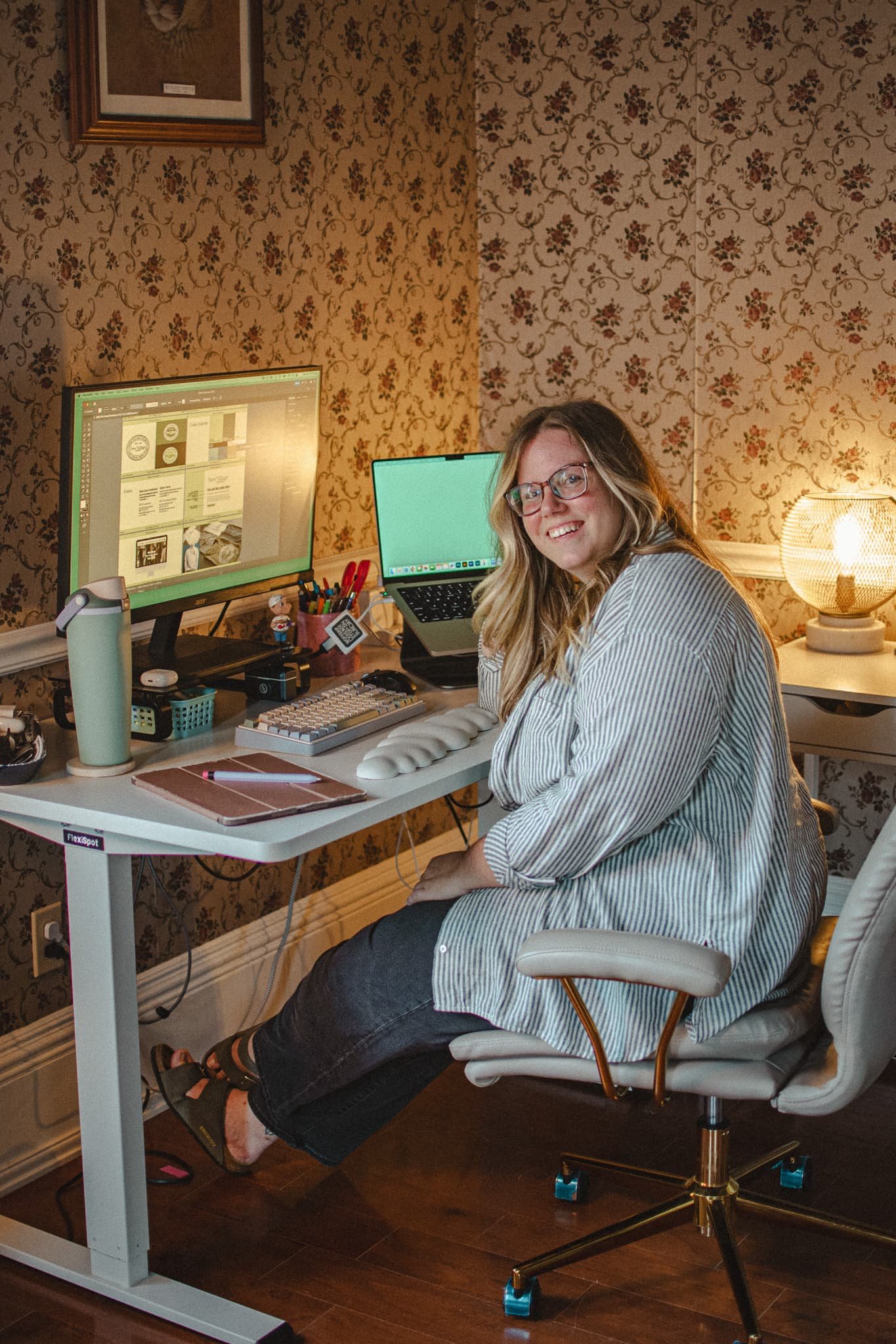 Paxton, a Nashville brand and web designer, drawing at her desk