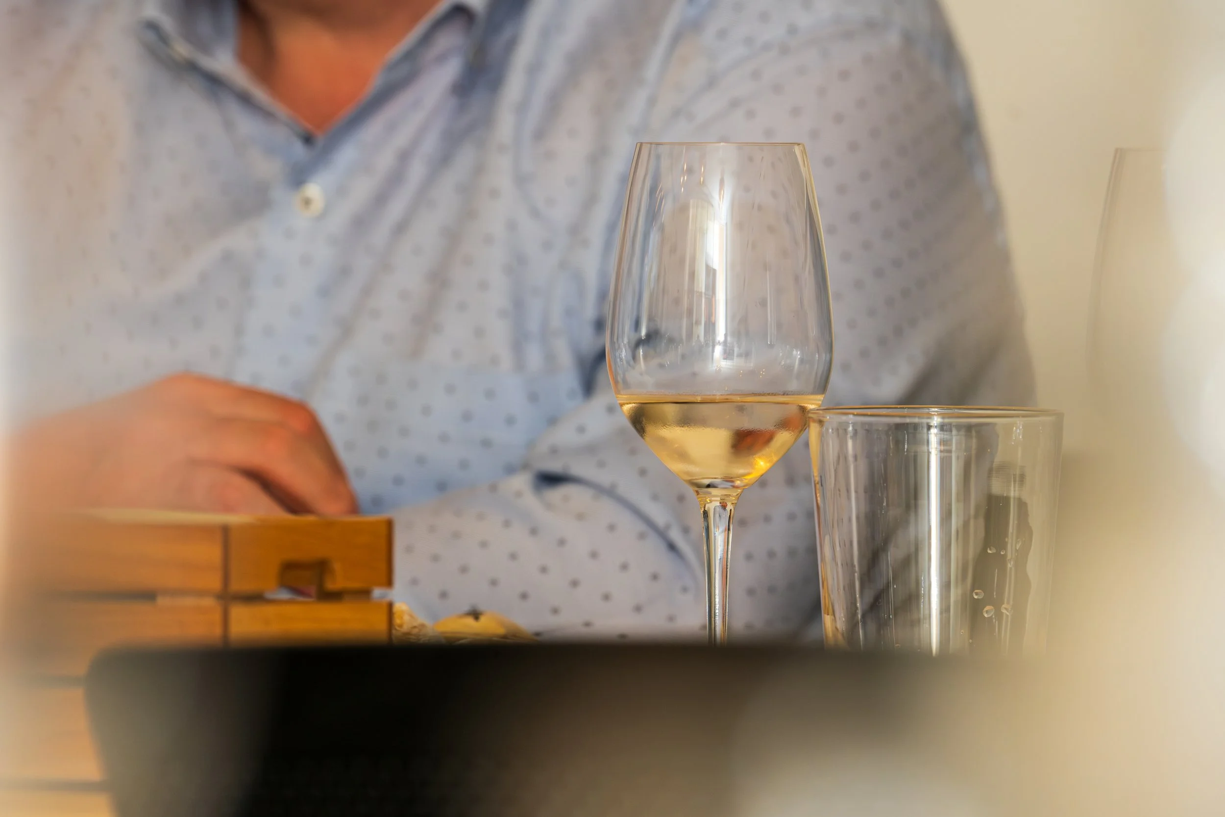 Telephoto detail of a wine glass