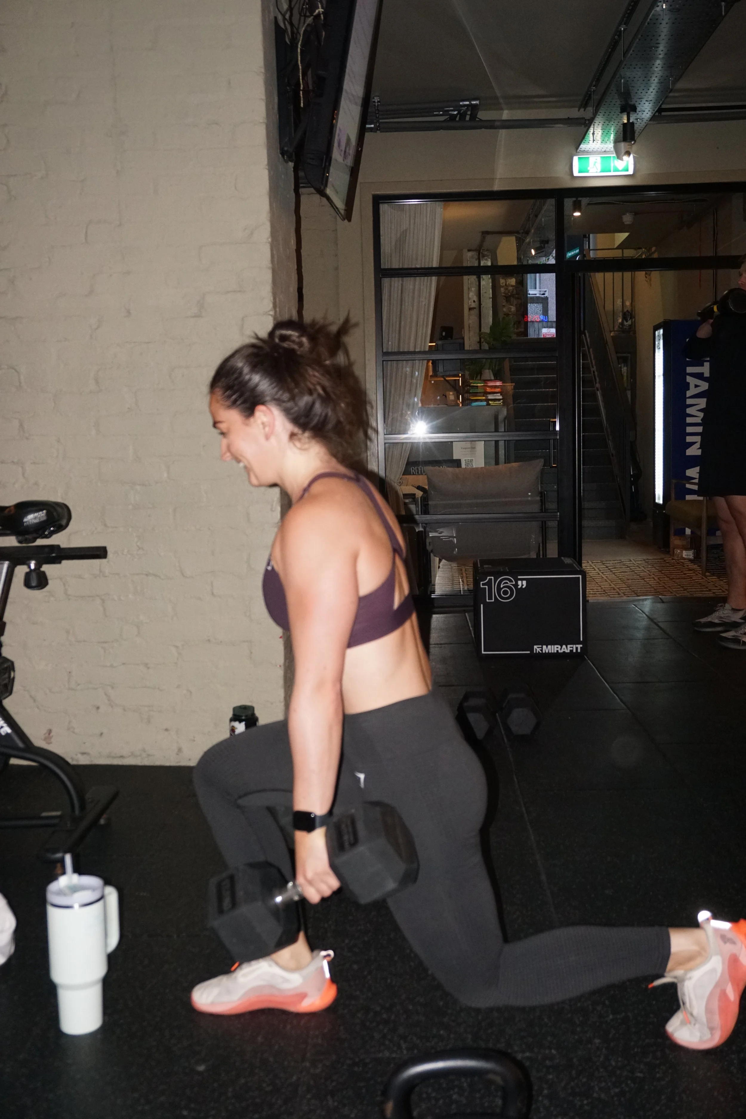 Coached strength session at SPACE using dumbbells