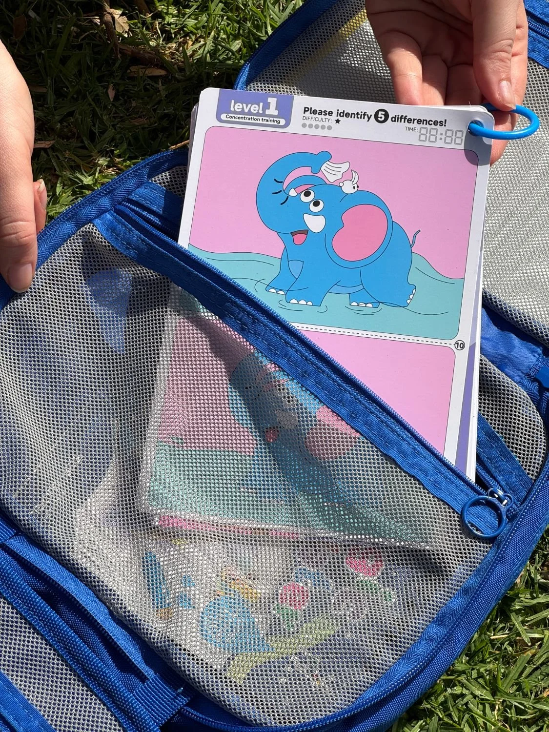 A spot-the-difference card tucked into the kit pocket