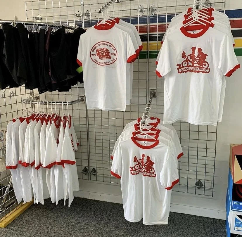 Sonny's Bike Shop anniversary T-shirts on display