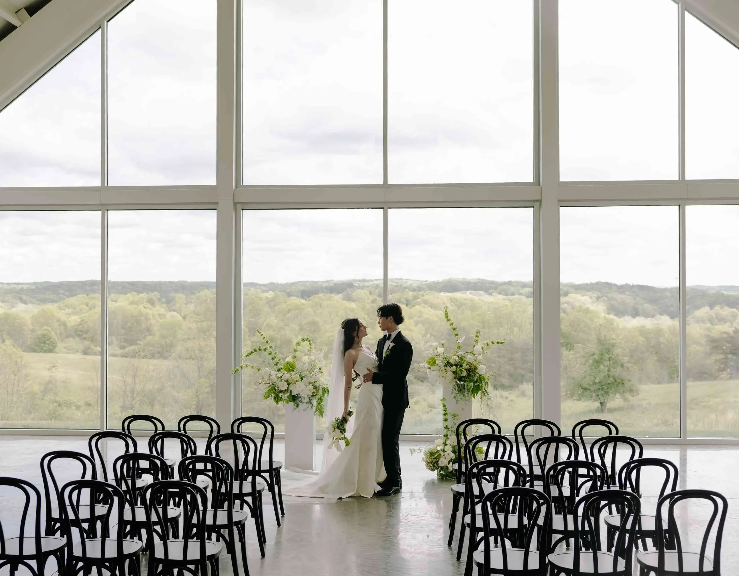 Couple portrait inside modern wedding venue