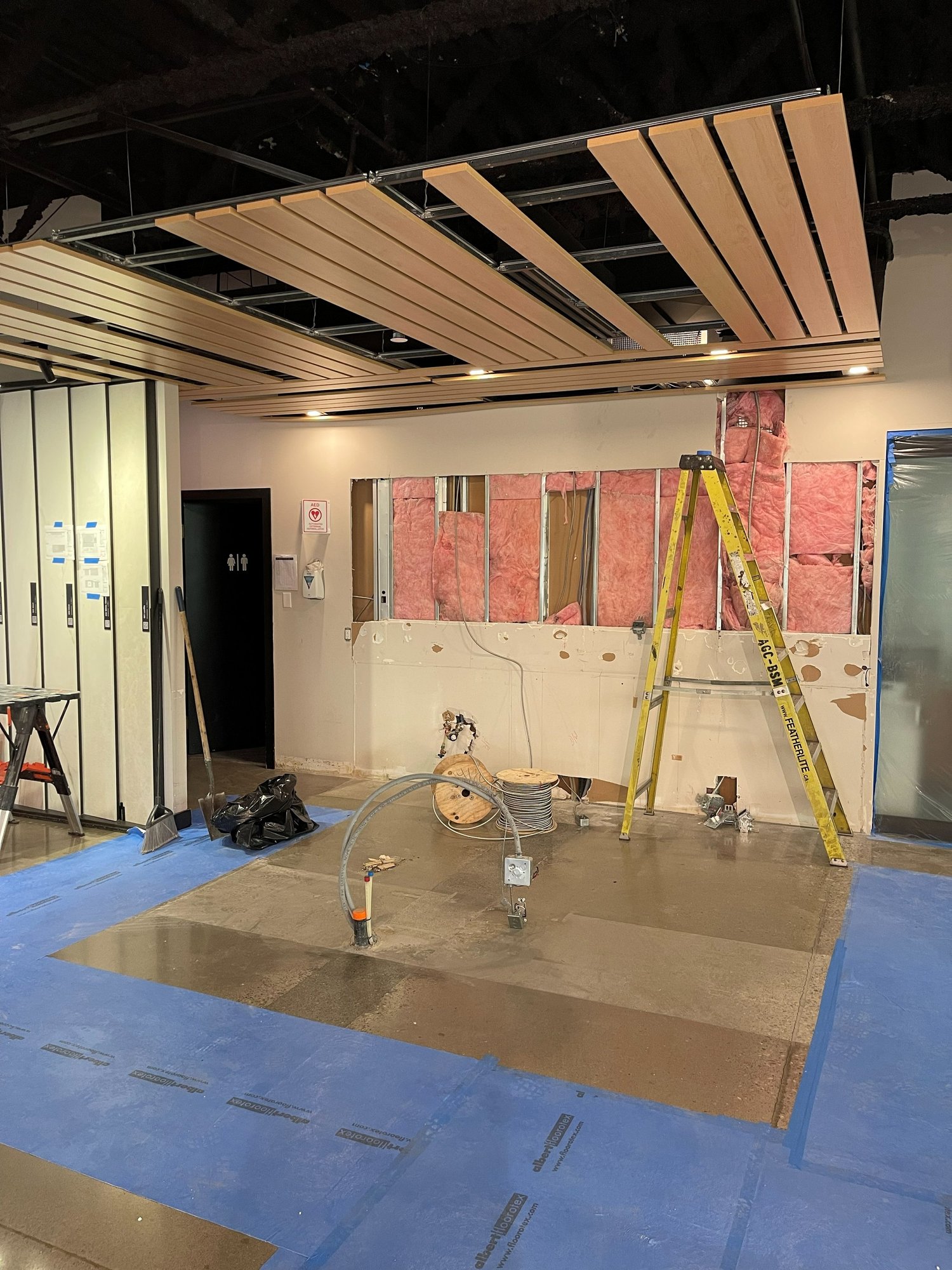 Caesarstone showroom in Vaughan during the renovation, with walls open and floors protected
