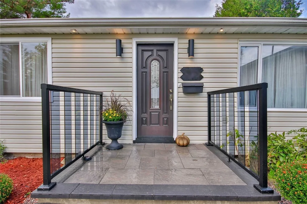Renovated front entrance with new railing