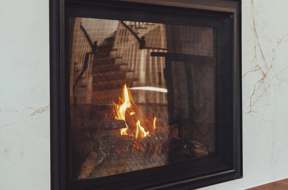 Close-up of the fireplace insert in the marble surround