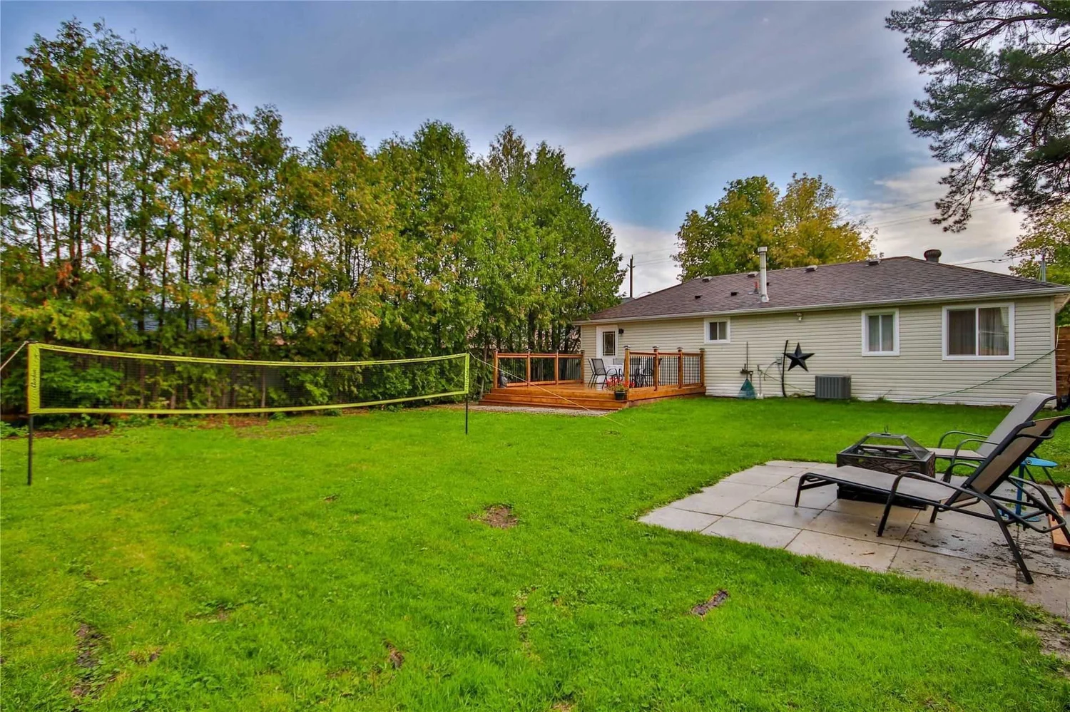 Backyard with lawn and deck after renovation