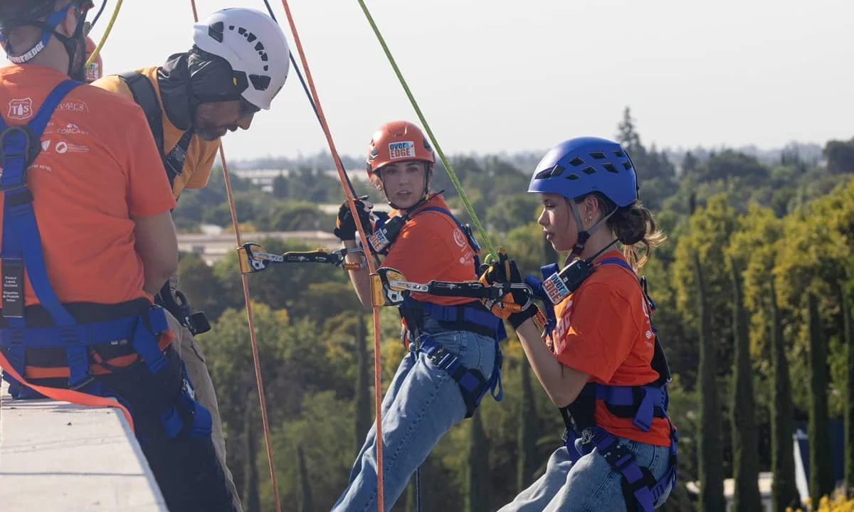 Participant preparing to go Over the Edge
