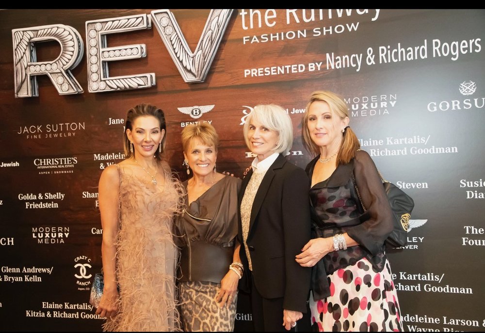 Susan Plummer with friends at the Rev the Runway fashion show benefit in Aspen, Colorado