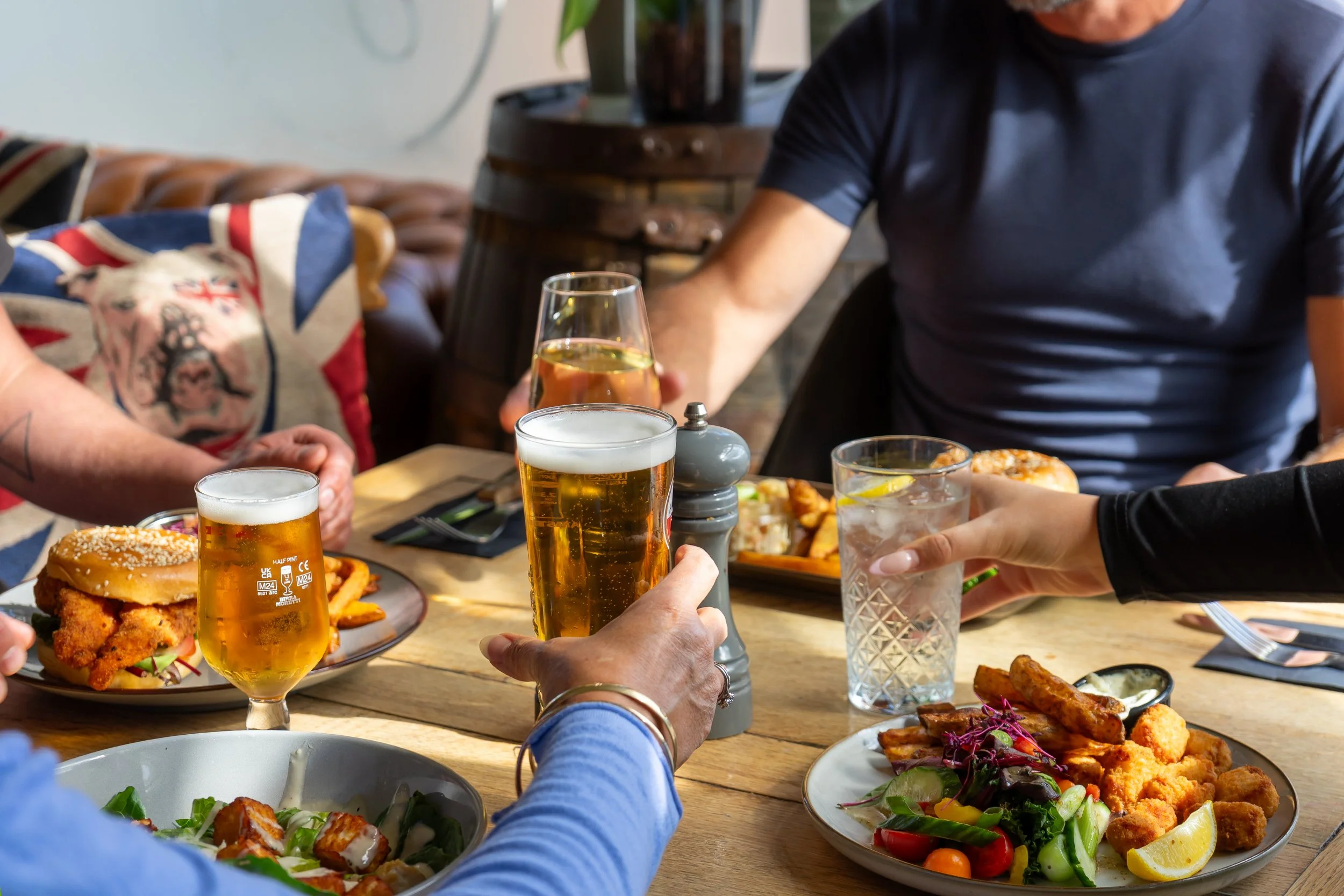 Diners enjoying lunch and drinks at The Folly Wine Bar Petersfield