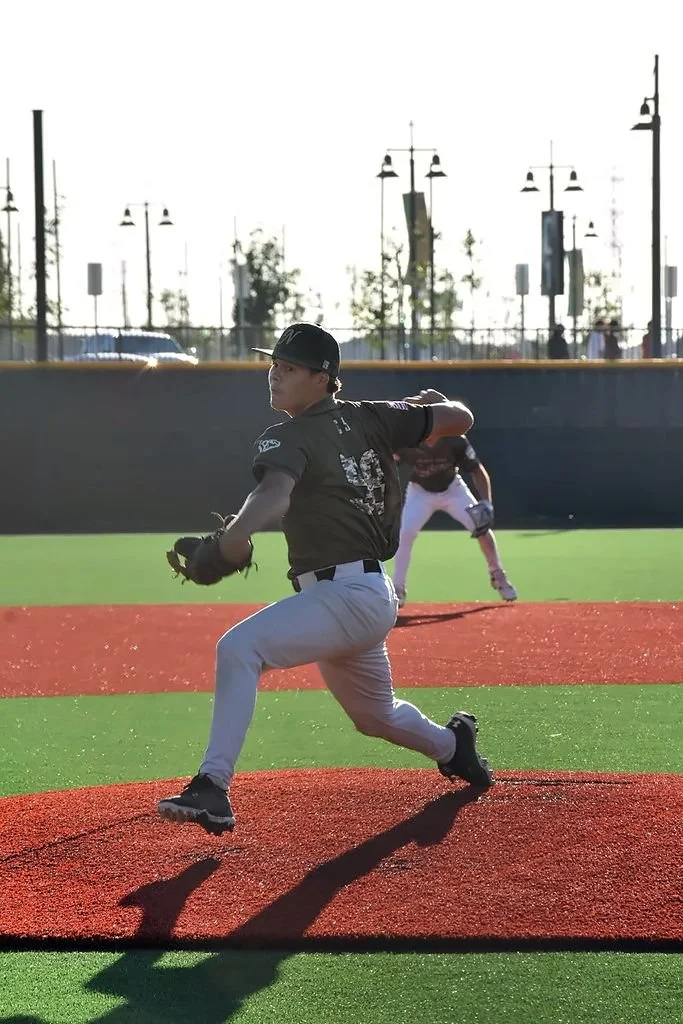 Inland Peak pitcher delivering a pitch