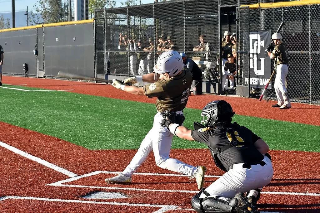 Inland Peak hitter swinging at home plate