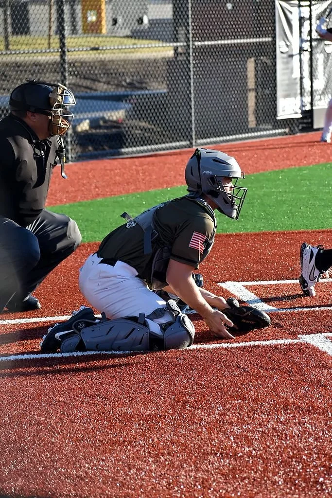 Catcher setting up behind the plate