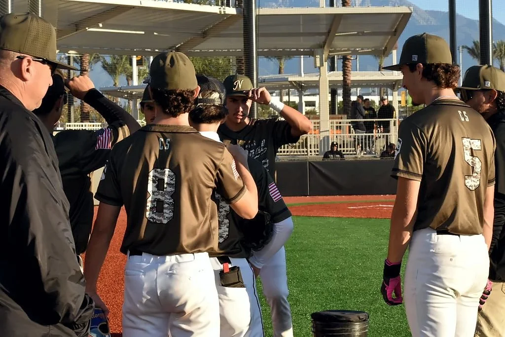 Coach talking with players