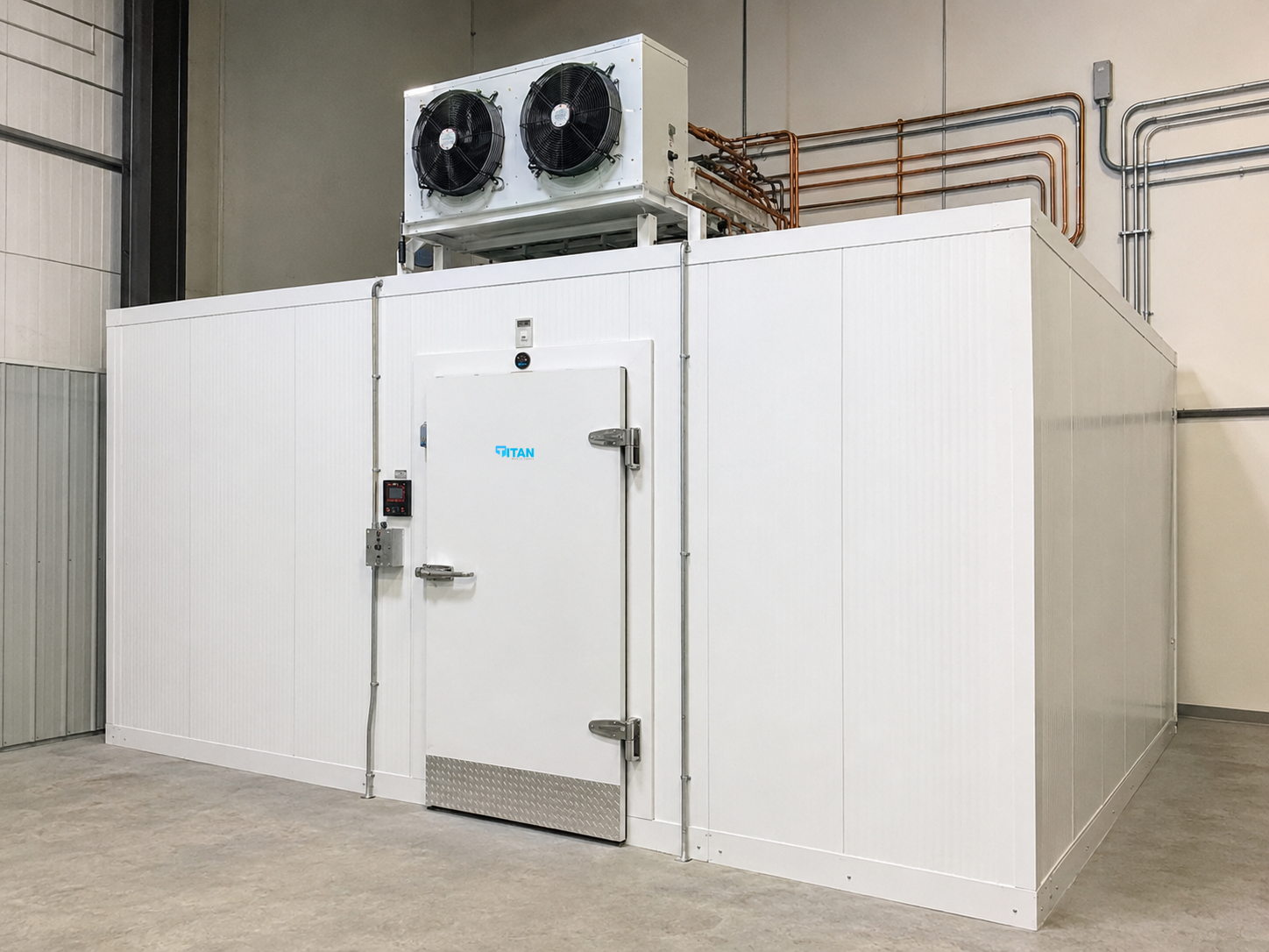 Exterior of a Titan-built walk-in freezer with refrigeration system in a GTA facility