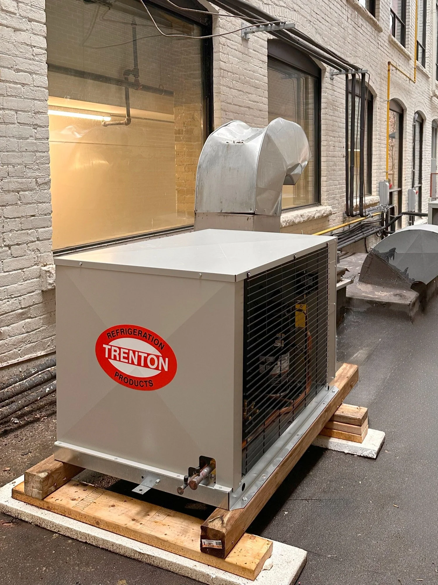 Outdoor commercial refrigeration condensing unit installation