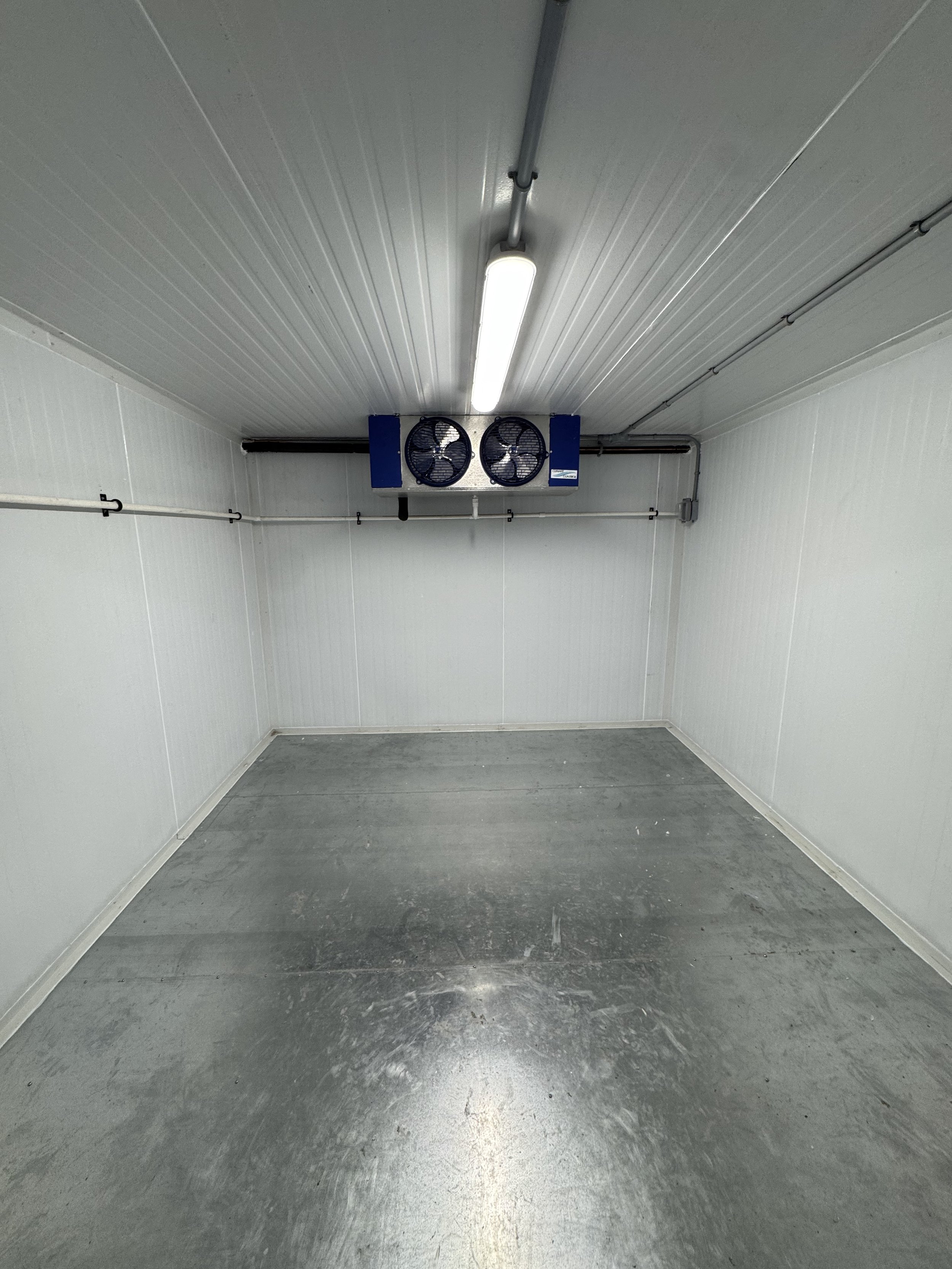 Walk-in cooler installation in progress at a Toronto restaurant back of house