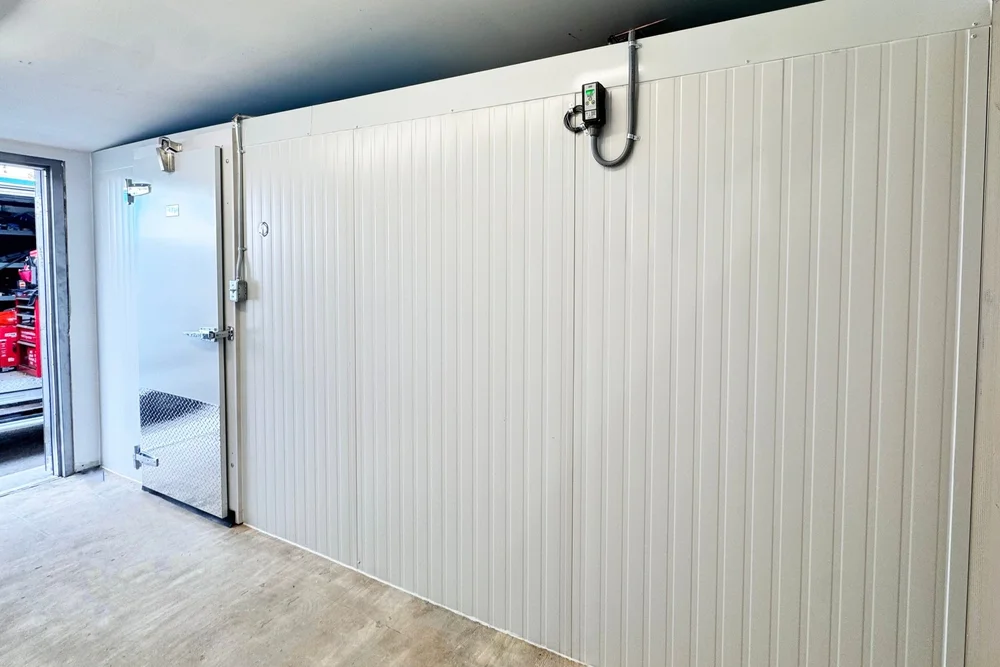 Walk-in cooler installation on a commercial job site in Southern Ontario