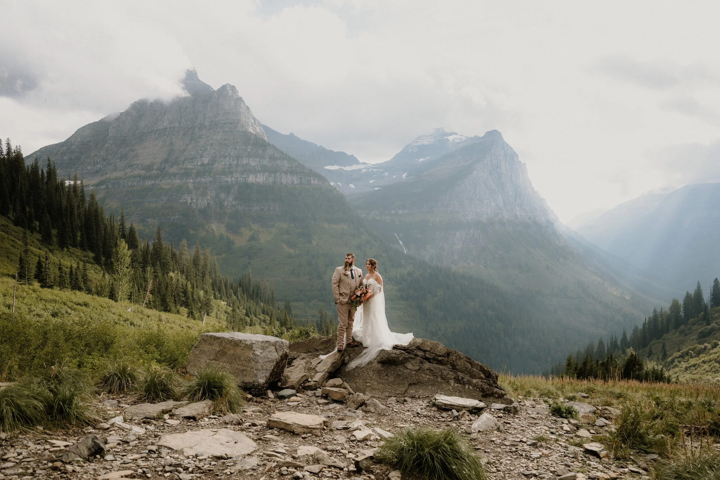 Couple at the Big Bend pullout on the Going-to-the-Sun Road in Glacier