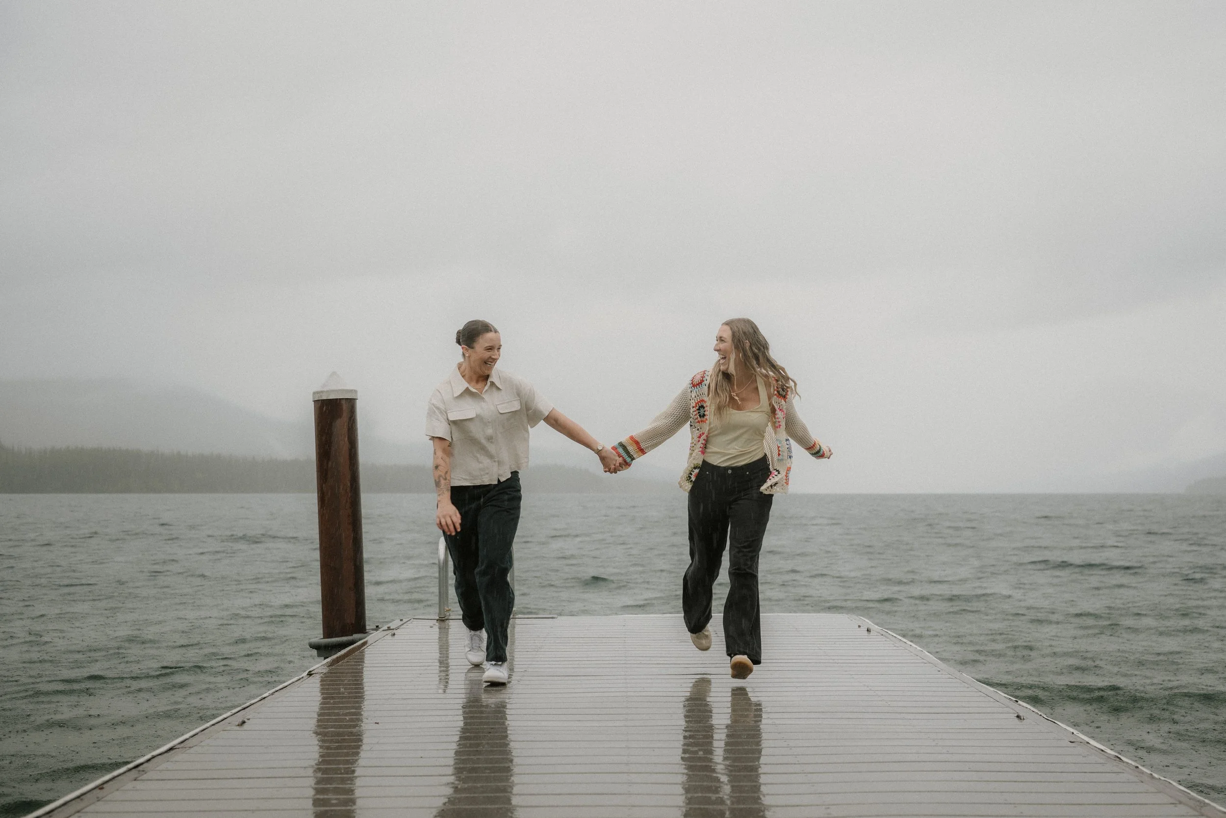 Taylor and Whitney together at Lake McDonald in Glacier National Park after getting engaged