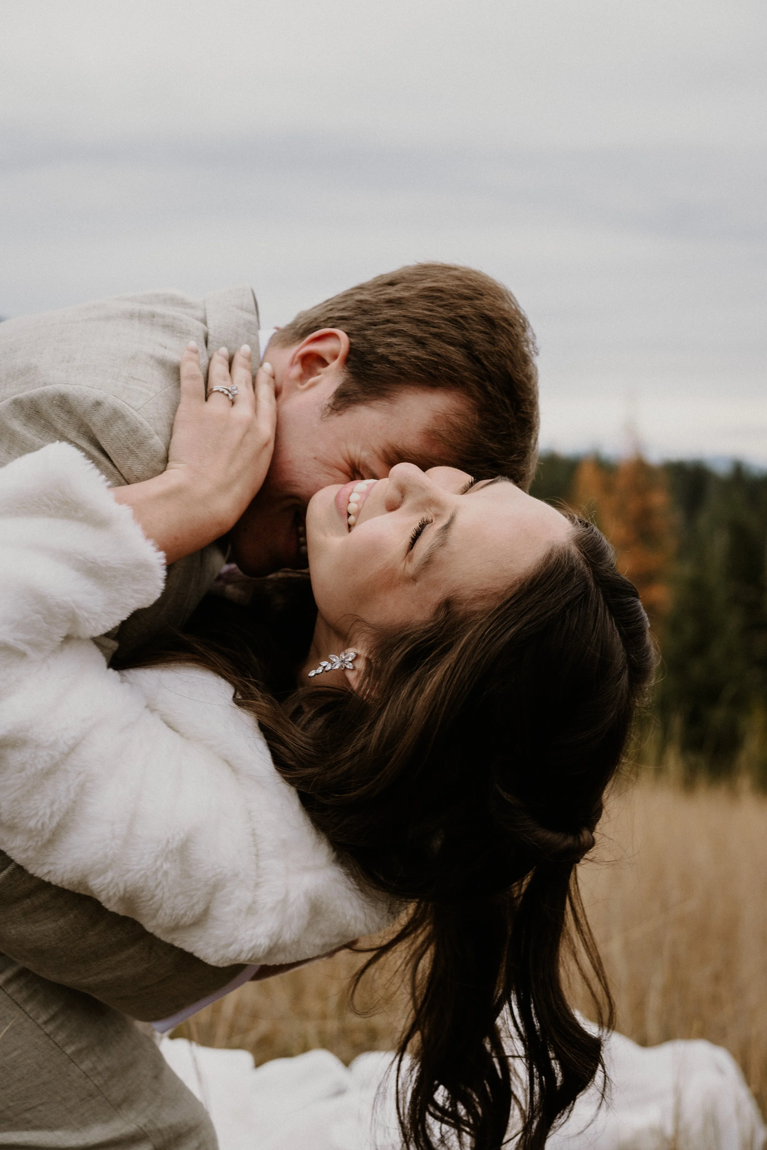 Snowy mountain backdrop for a Glacier National Park winter elopement