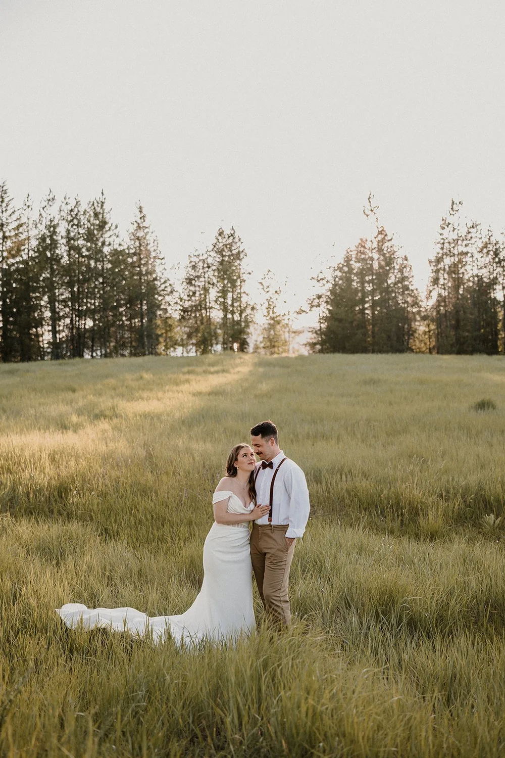 Couple eloping at Glacier National Park during golden hour, photographed by Stan Todorov