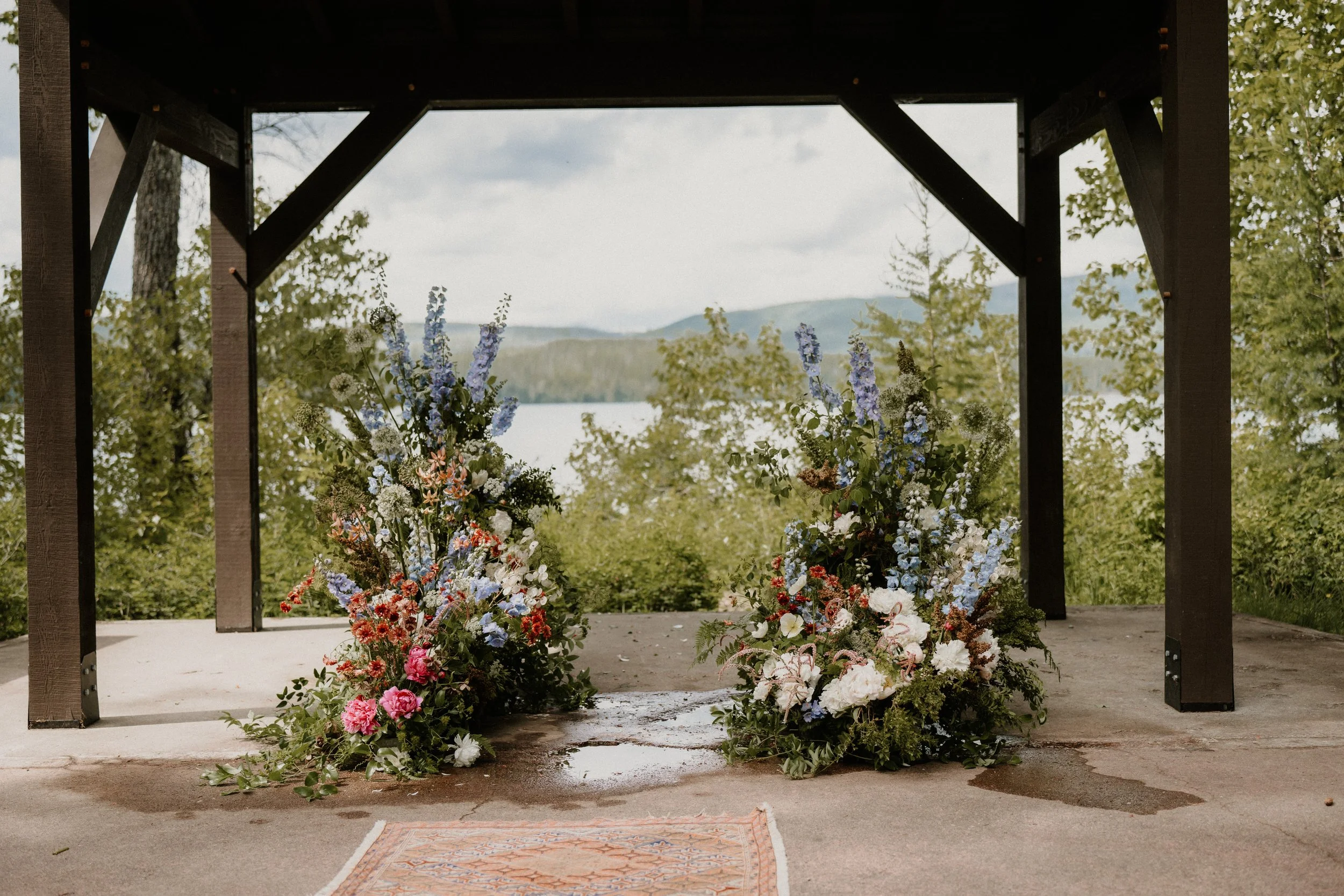 Bride and groom on the Apgar shoreline of Lake McDonald