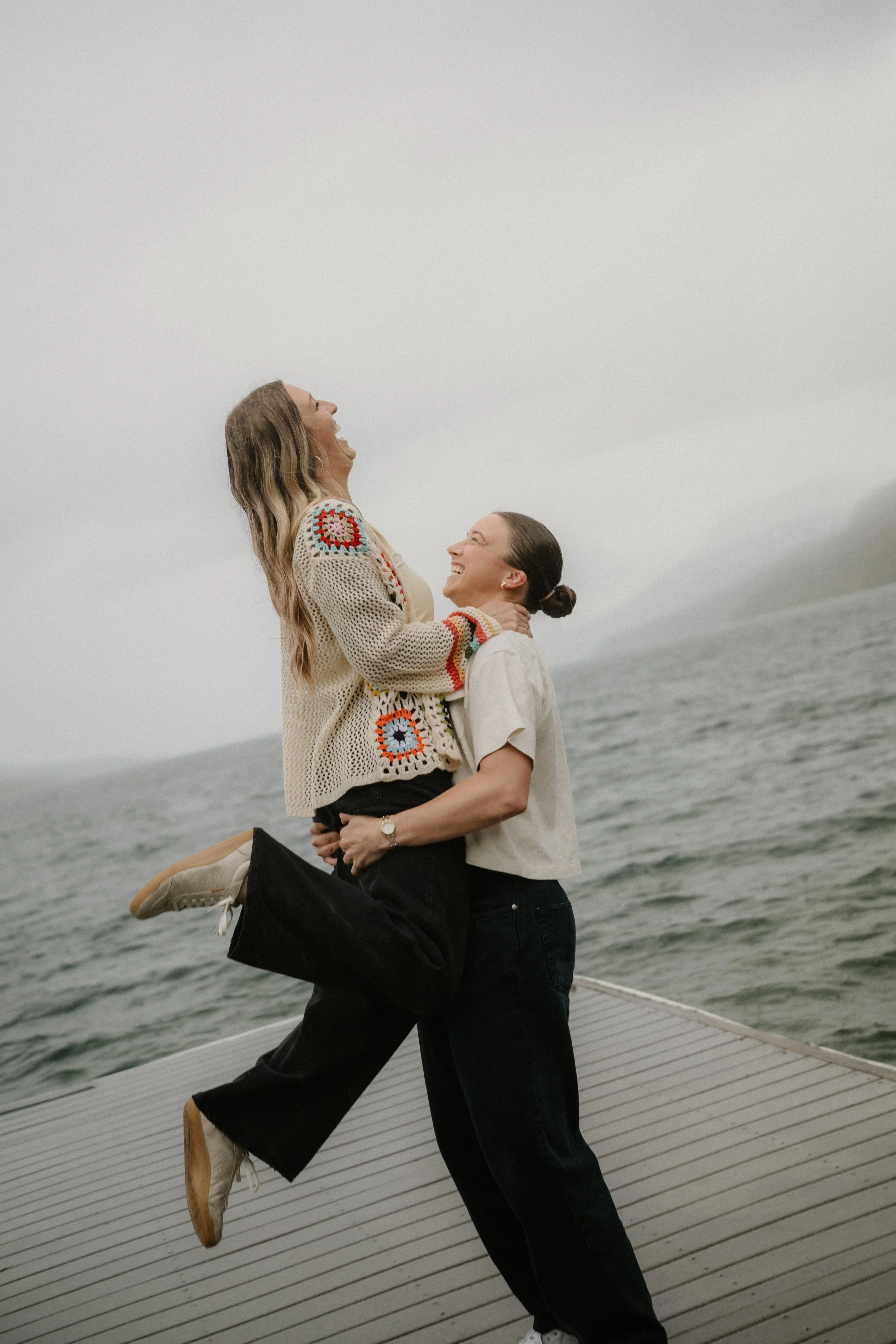 Taylor and Whitney portrait on the Lake McDonald shoreline in Glacier