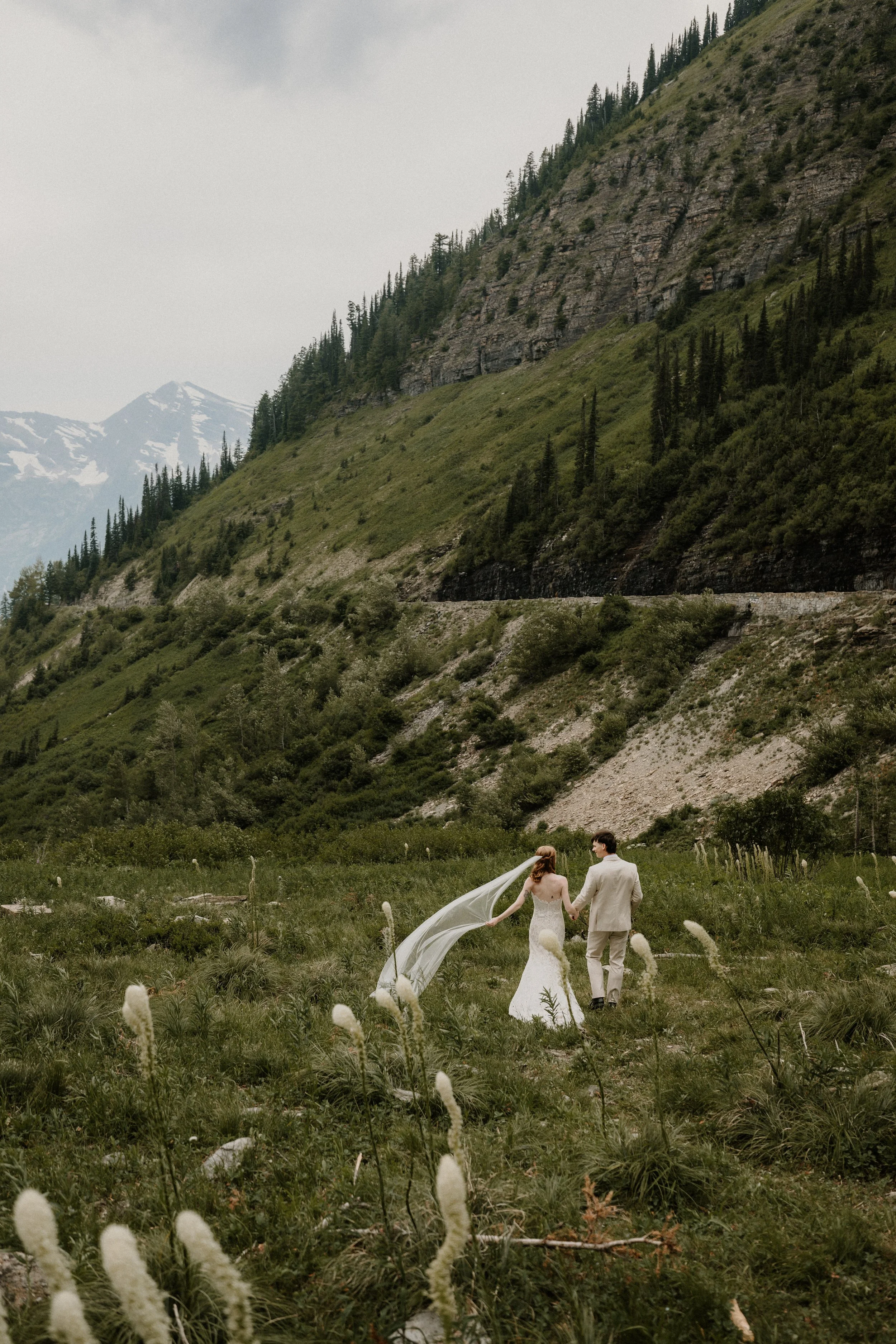Fall elopement with golden larch trees in Glacier National Park