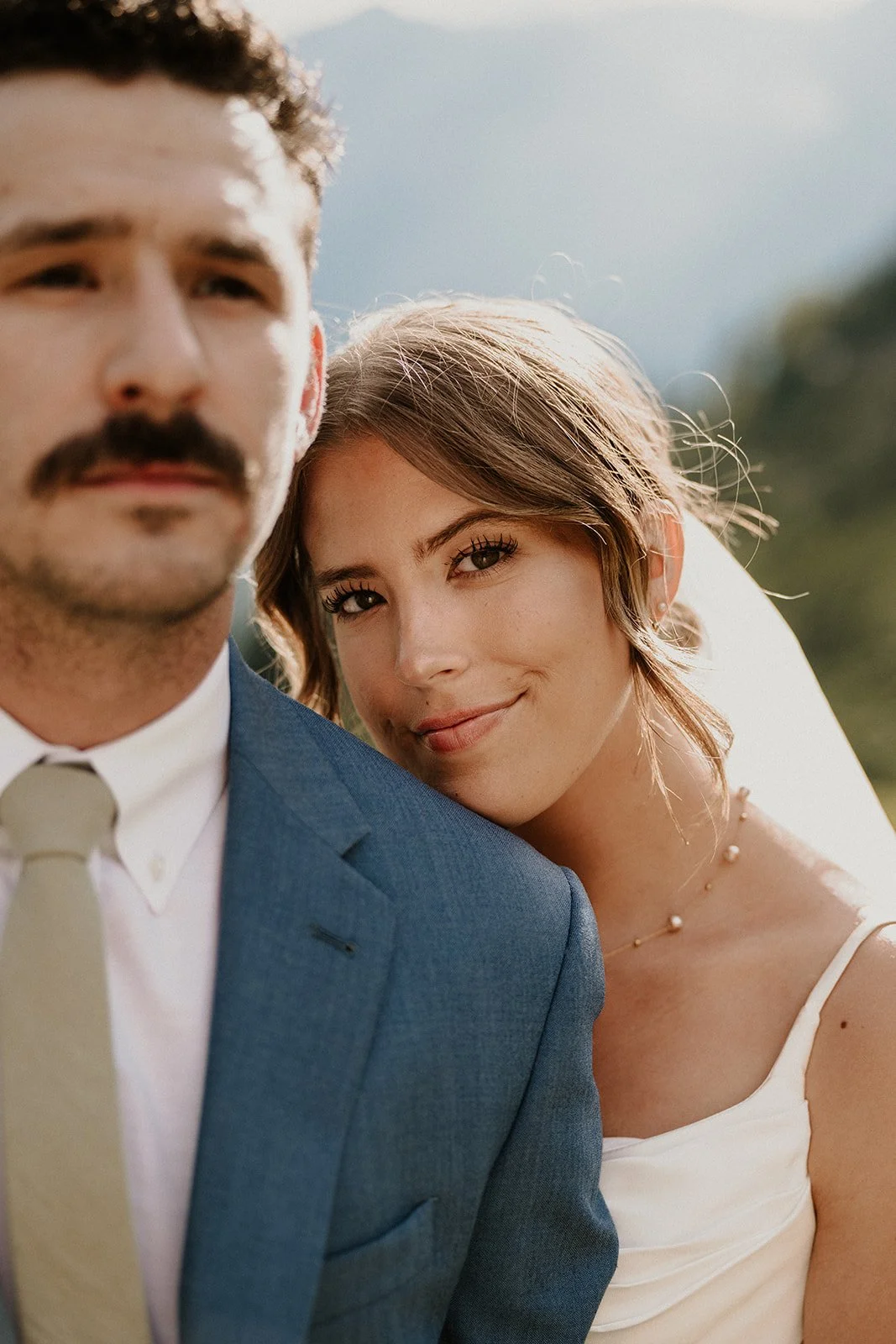 Couple sharing a quiet moment surrounded by Montana wilderness near Kalispell and Flathead Valley