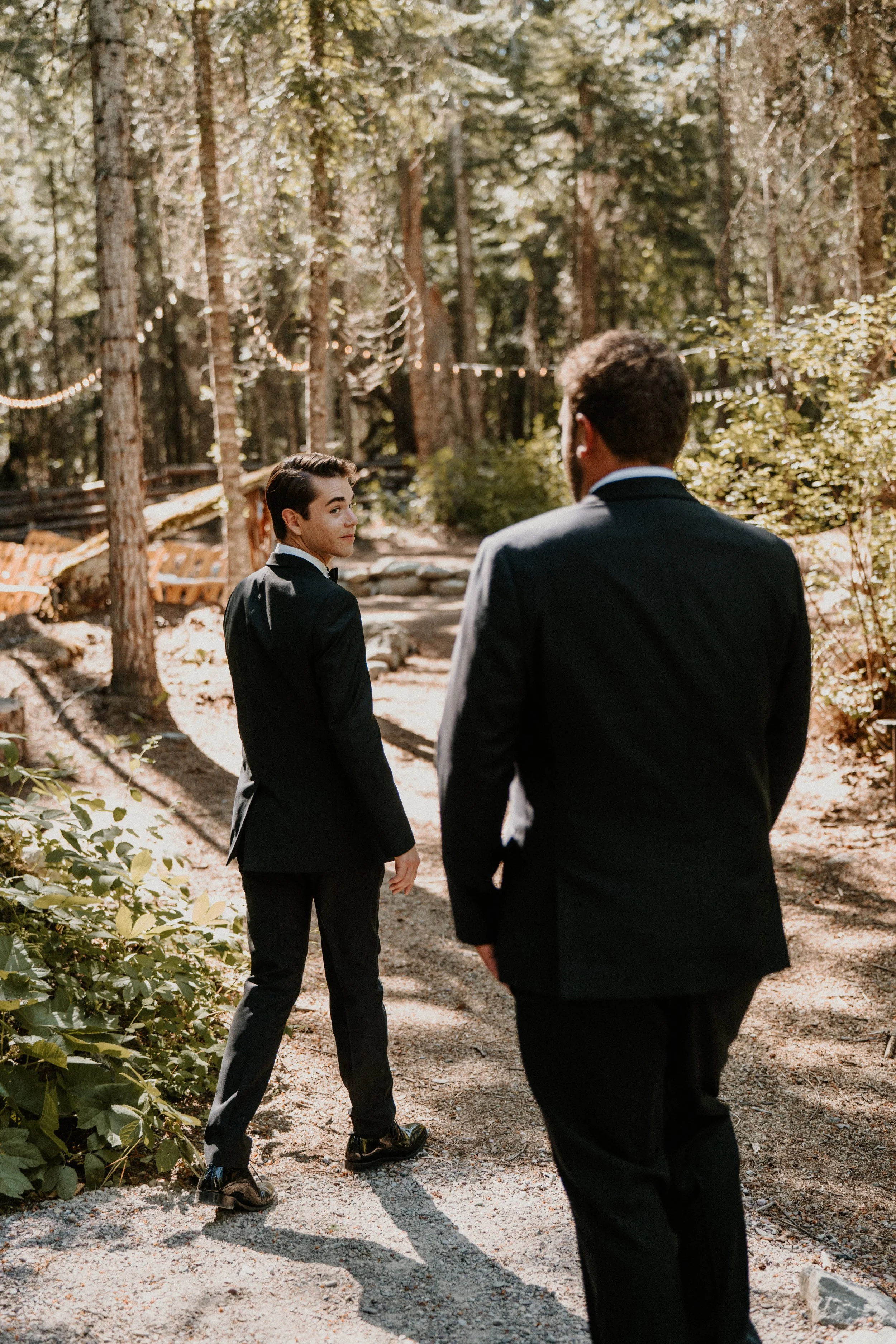 Couple sharing a quiet moment during a Glacier National Park elopement photographed by Stan Todorov Photography