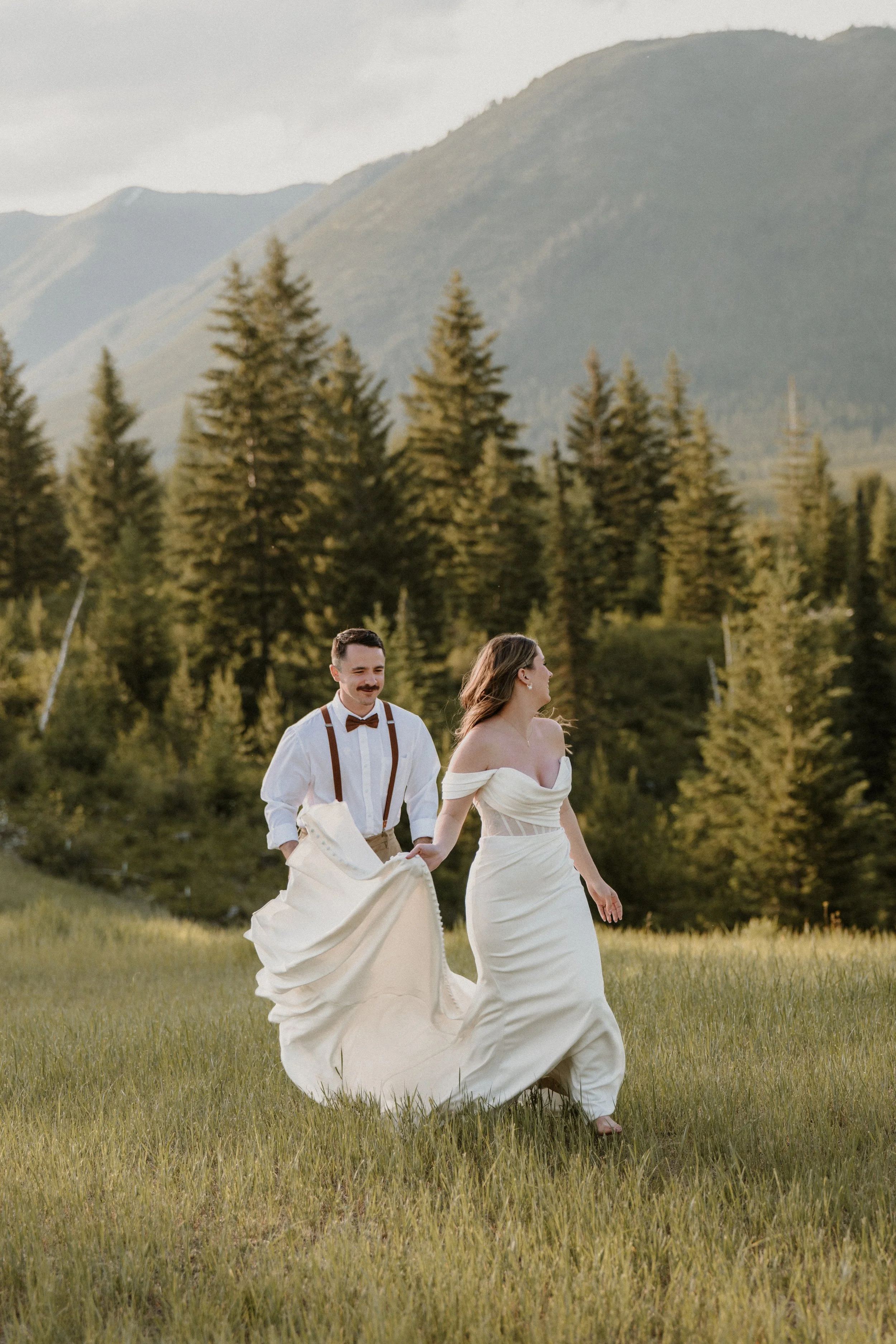 Couple at golden hour during a fall elopement in Glacier National Park