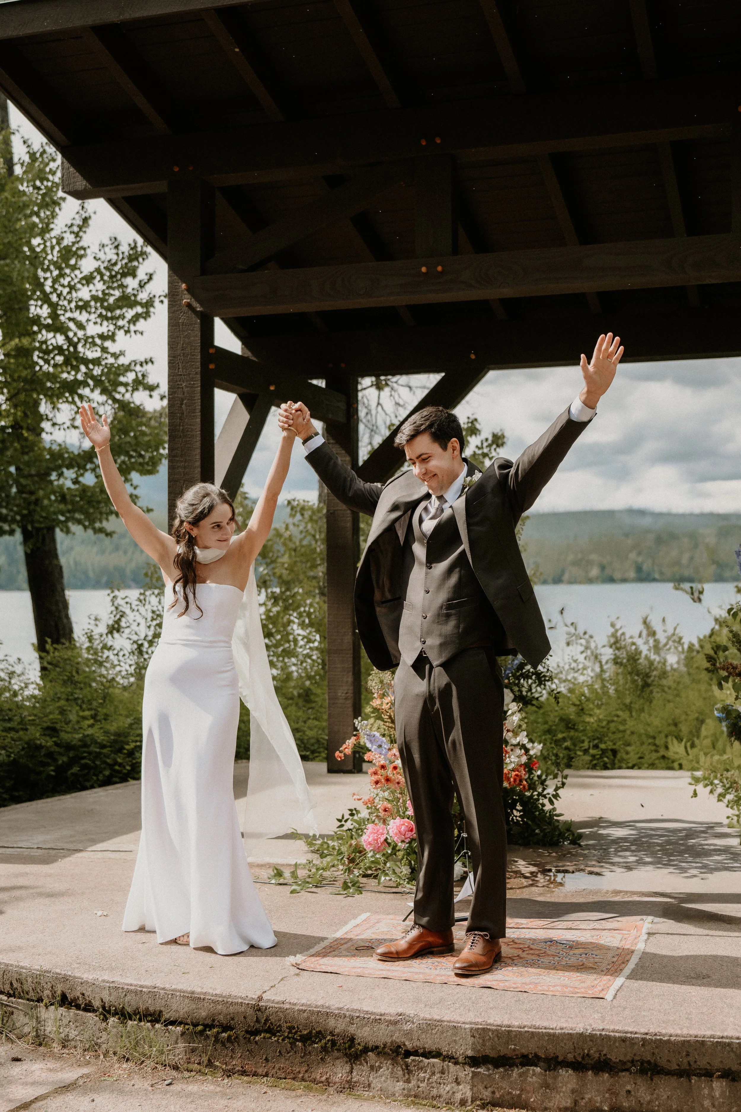 Wedding guests seated on the benches at Apgar Amphitheater in Glacier