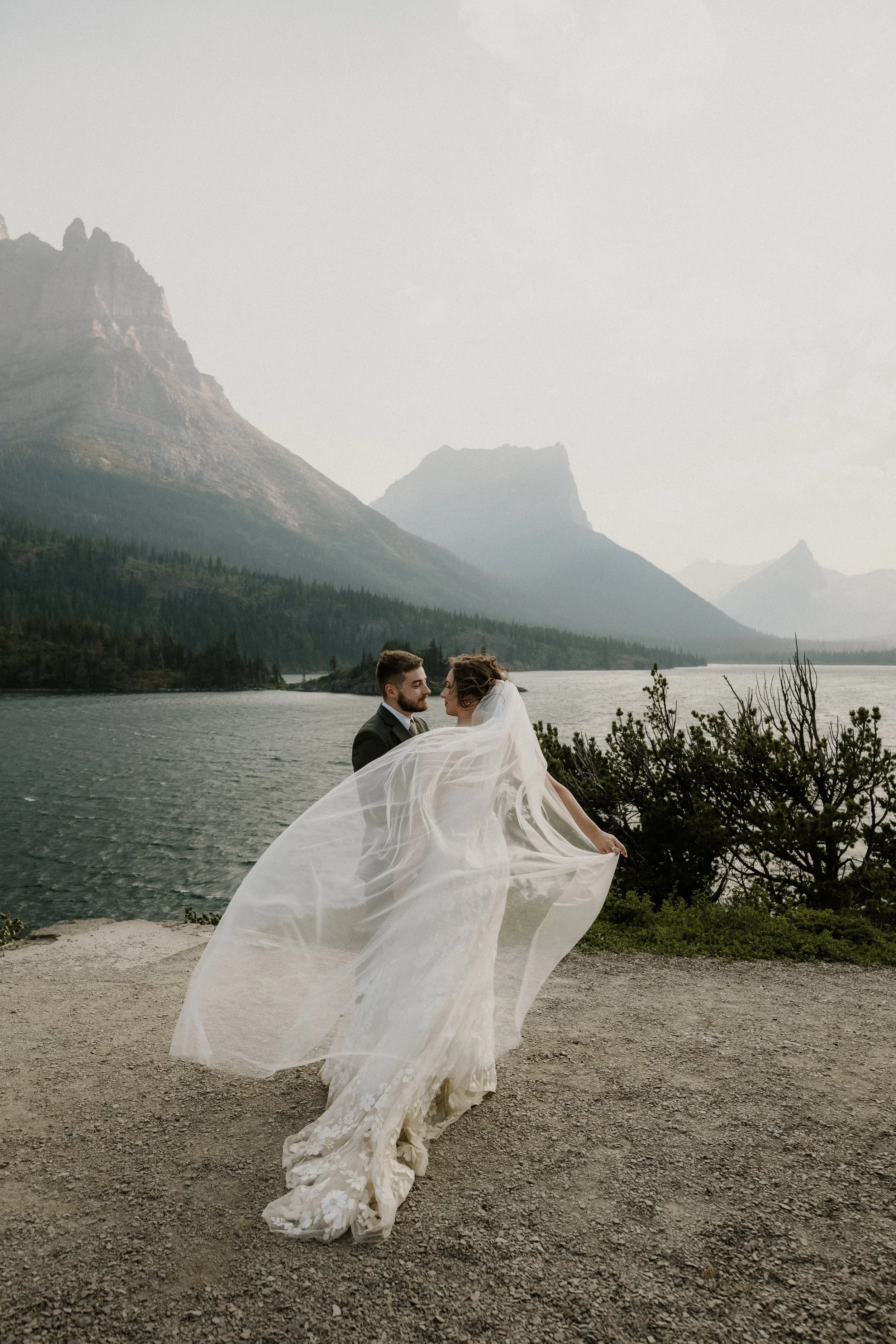 Winter elopement ceremony in the snow at Glacier National Park