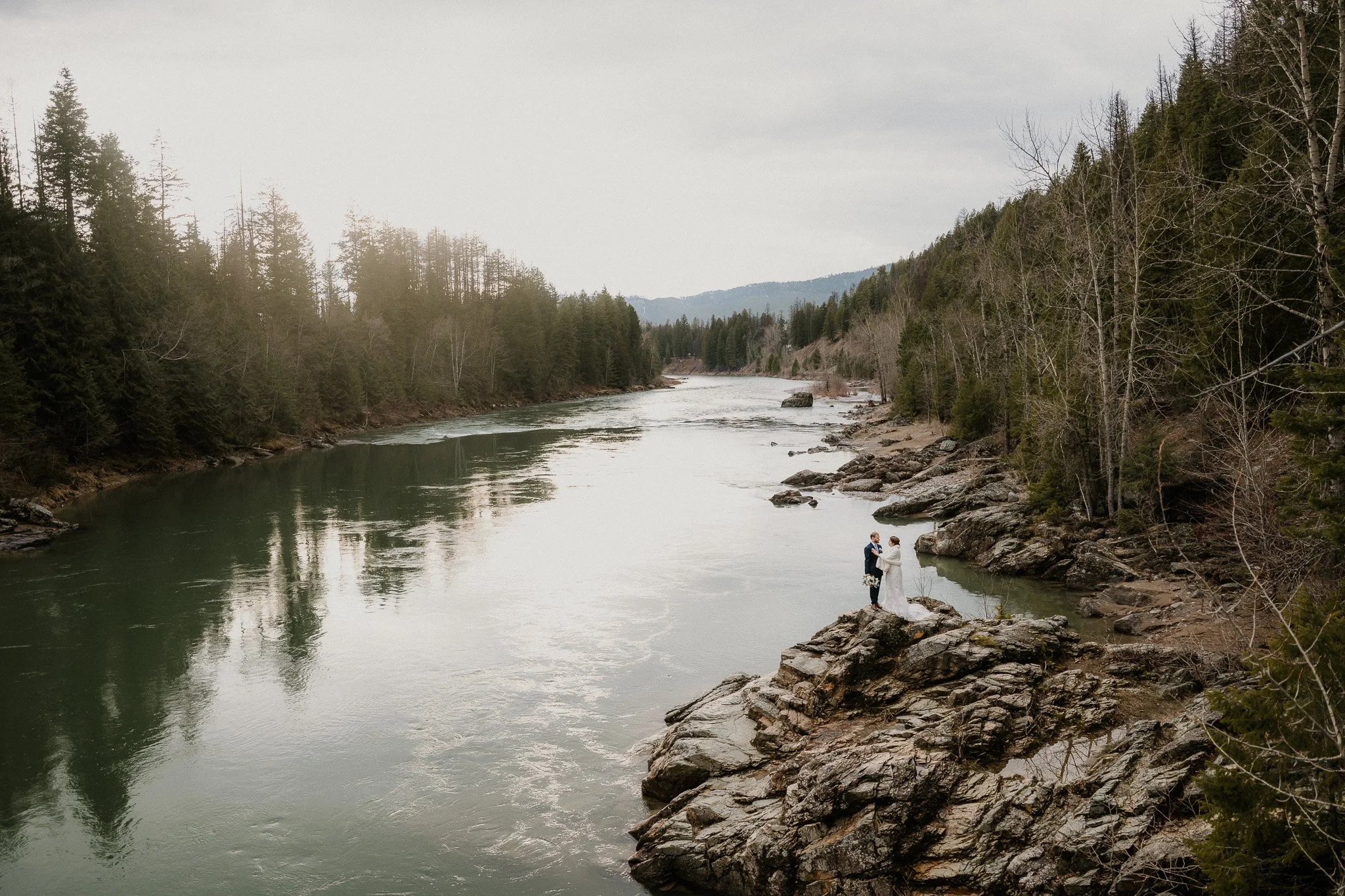 Couple eloping in Glacier National Park, Montana, photographed by Stan Todorov