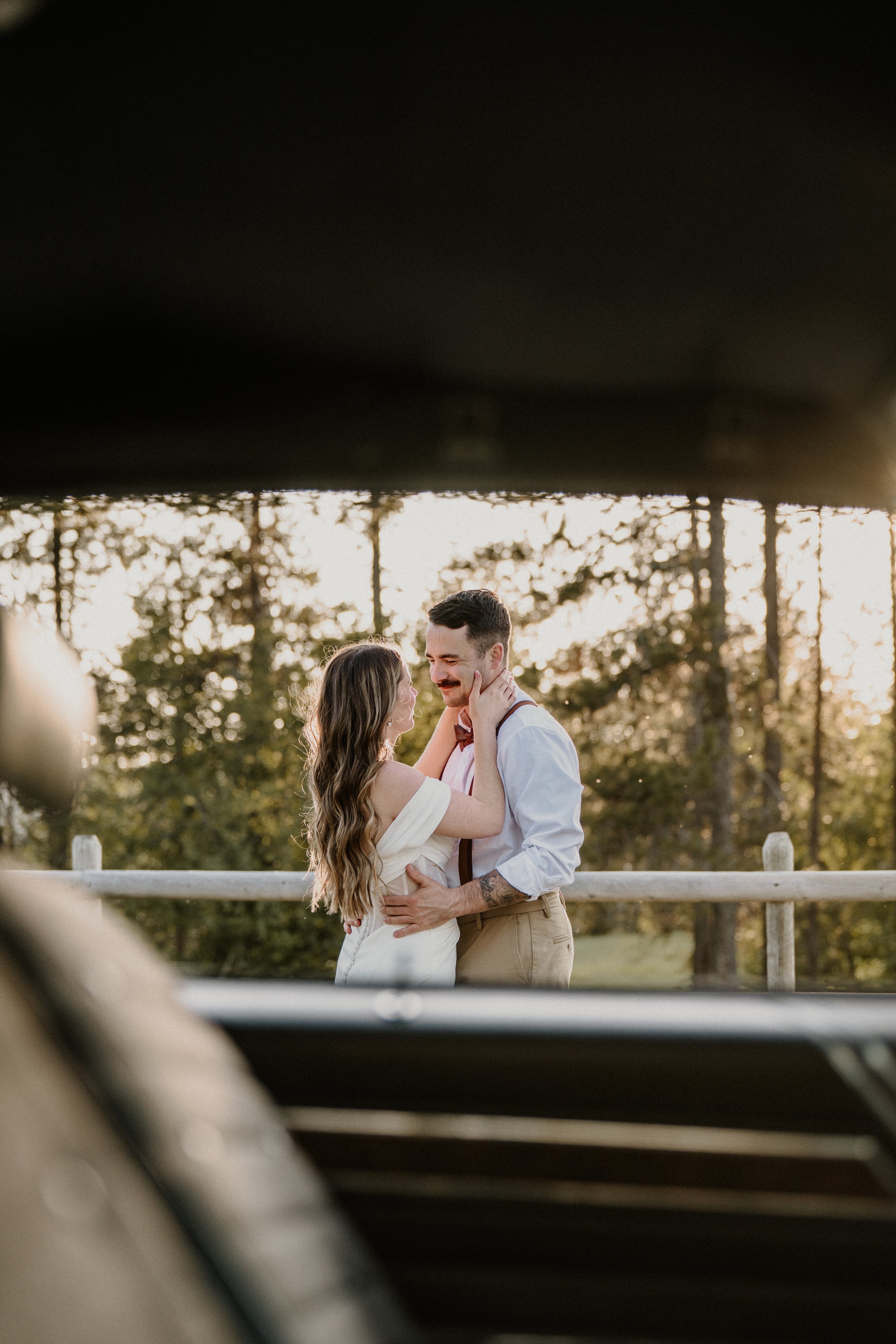 Couple among golden fall colors during their Glacier National Park elopement